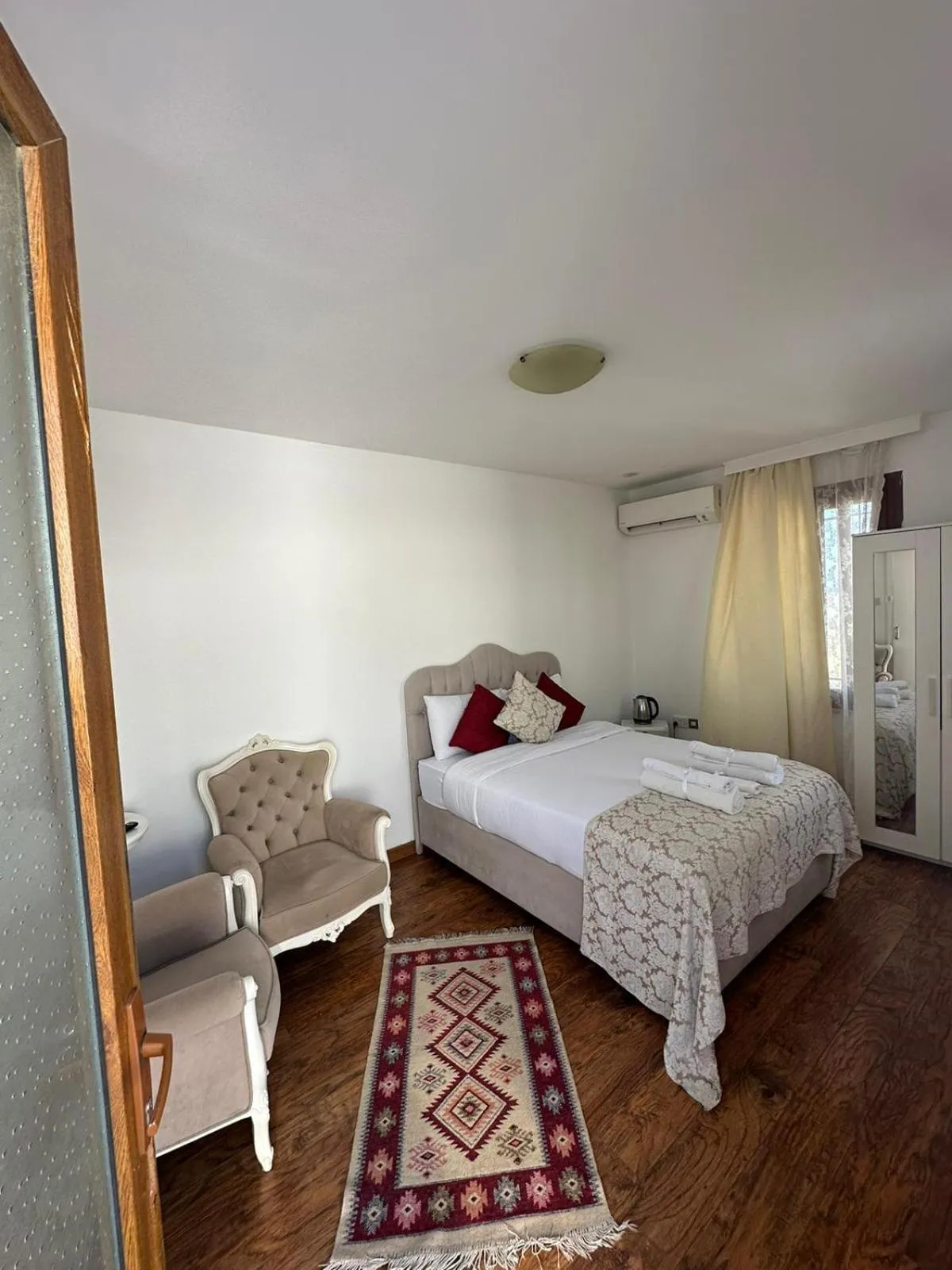 Bed in Lord's Residence Boutique Hotel