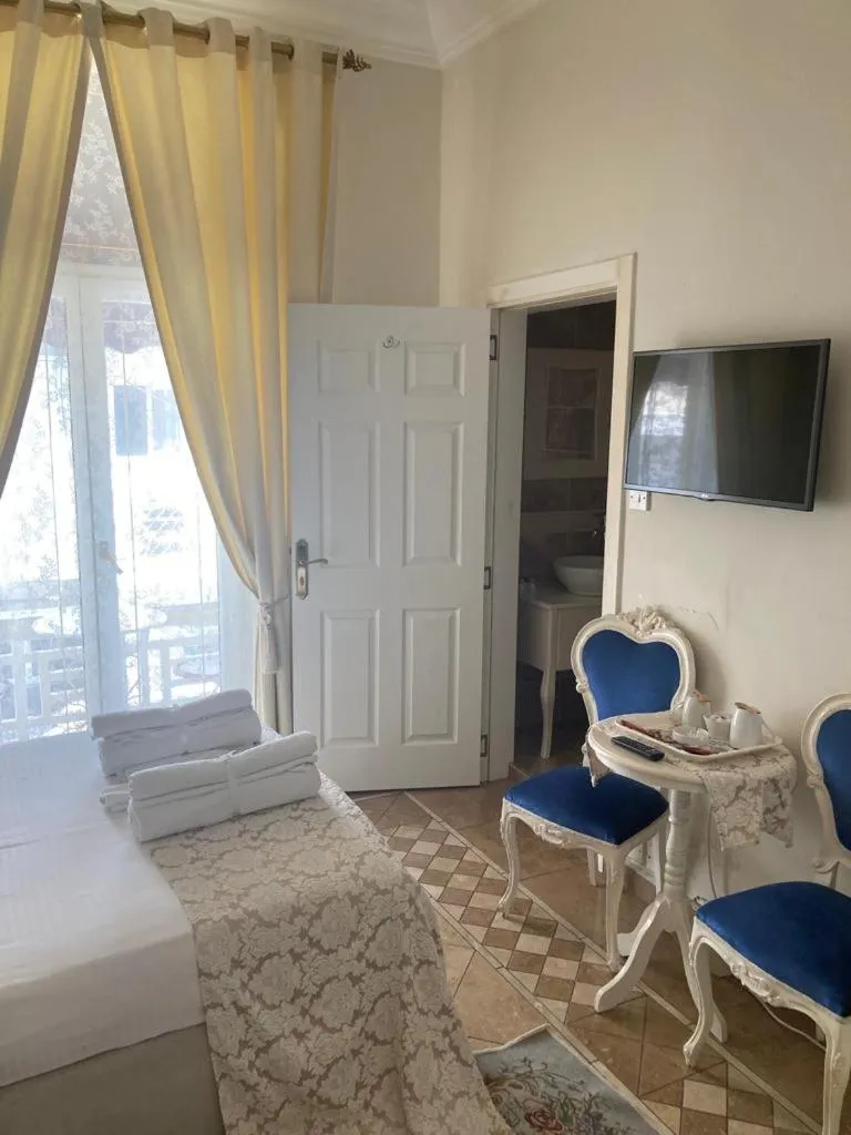 Bed in Lord's Residence Boutique Hotel