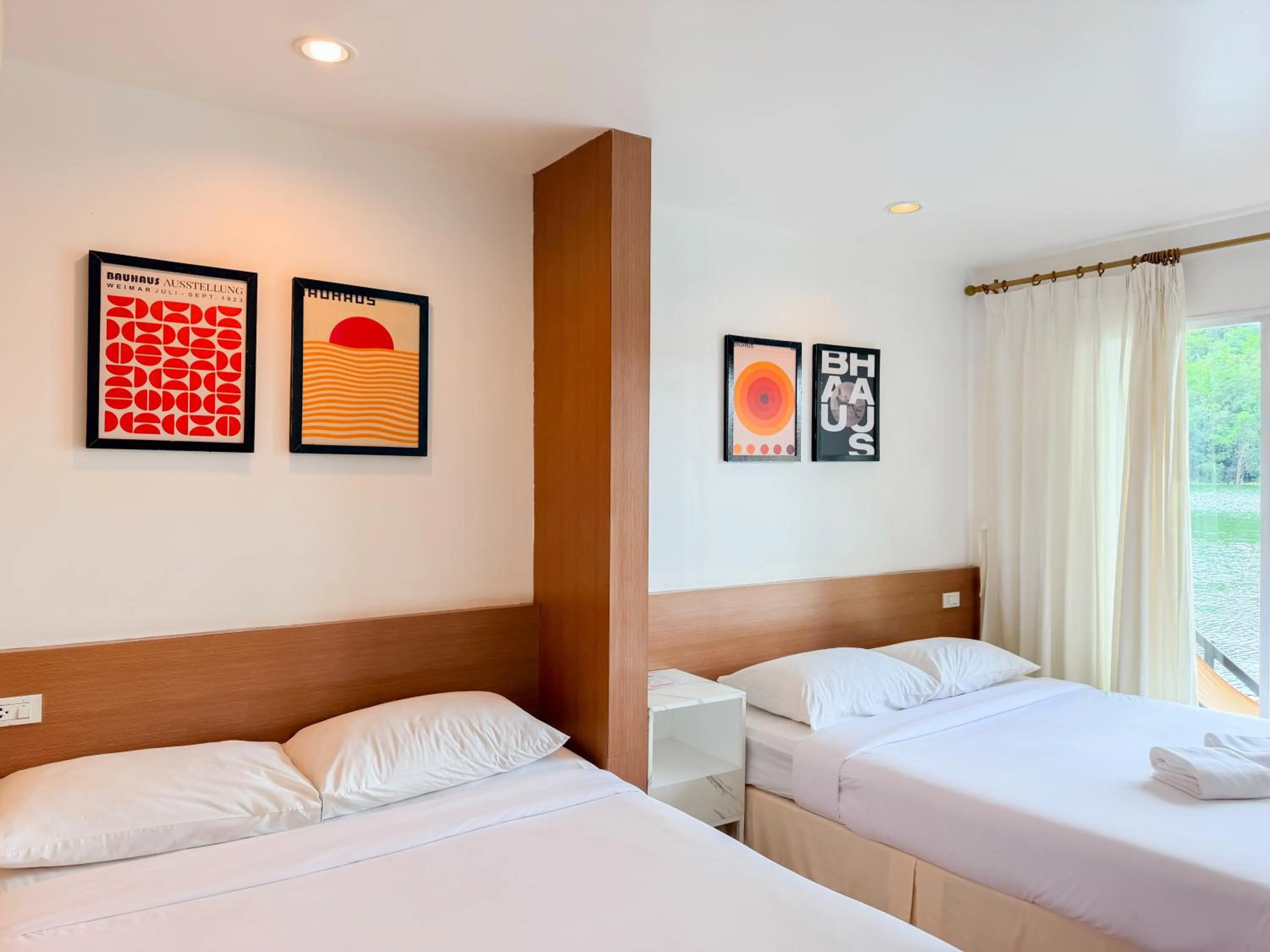 Bed in Raya Buri Resort Kanchanaburi