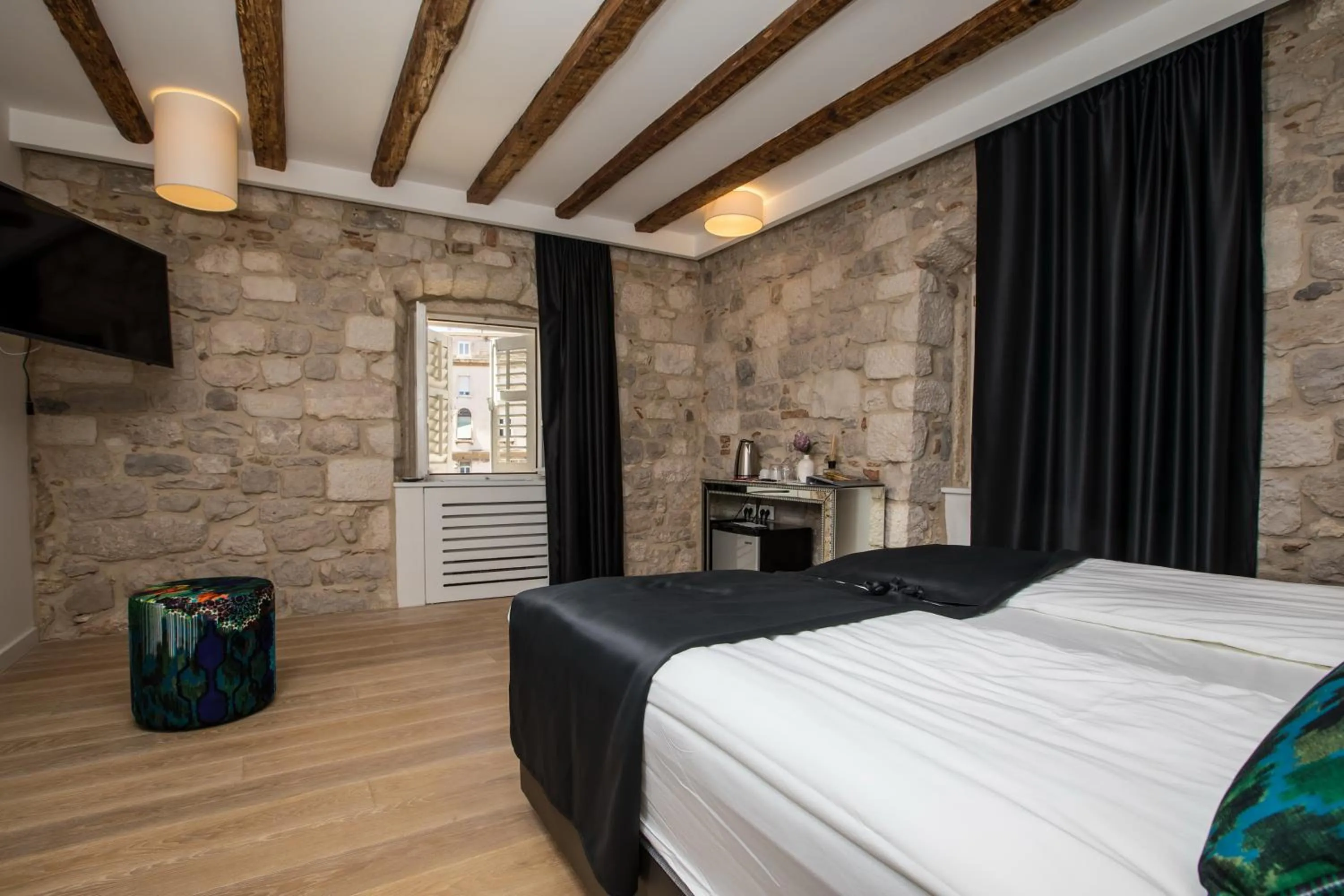 Bed in Spalato Luxury Rooms