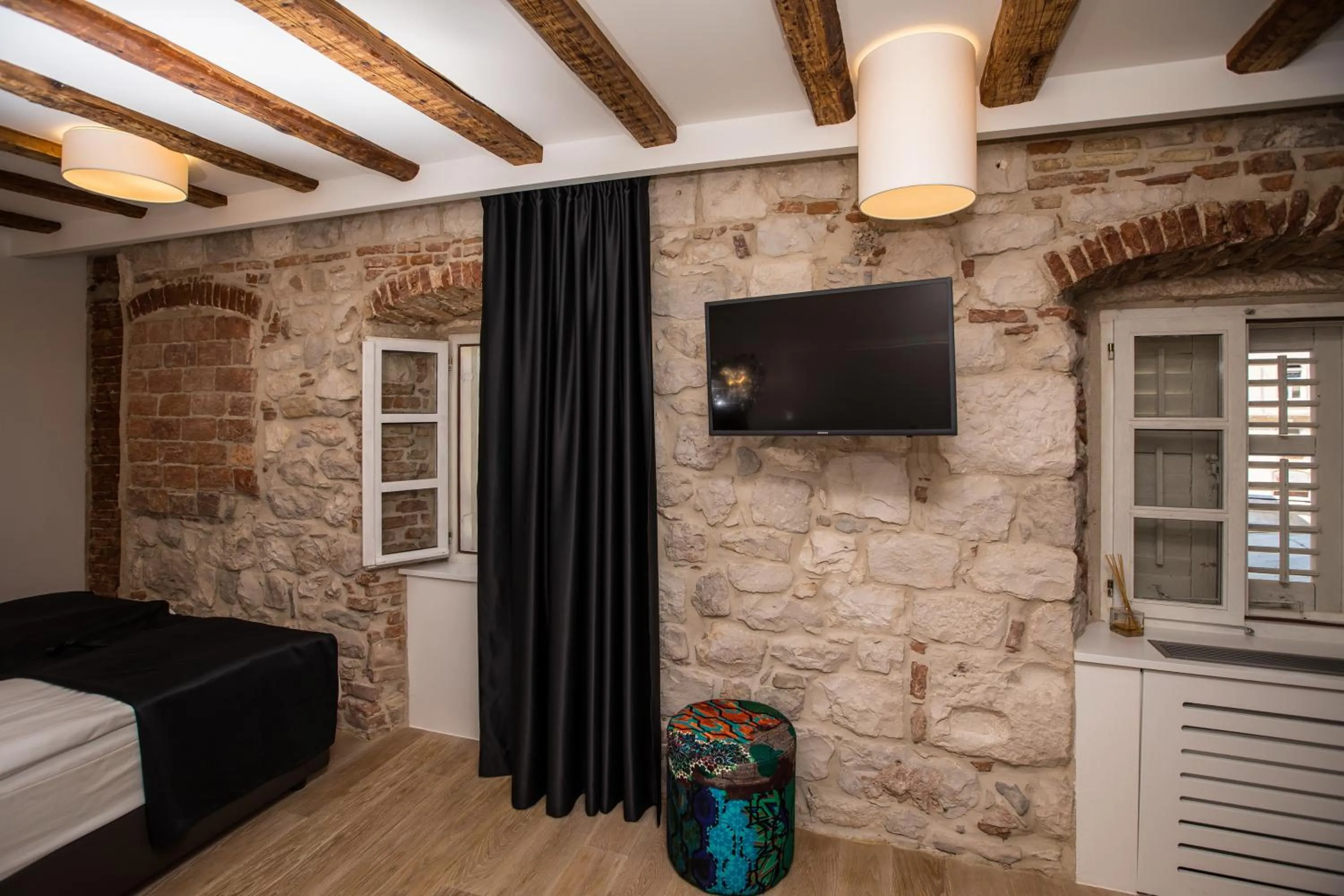 Bed in Spalato Luxury Rooms