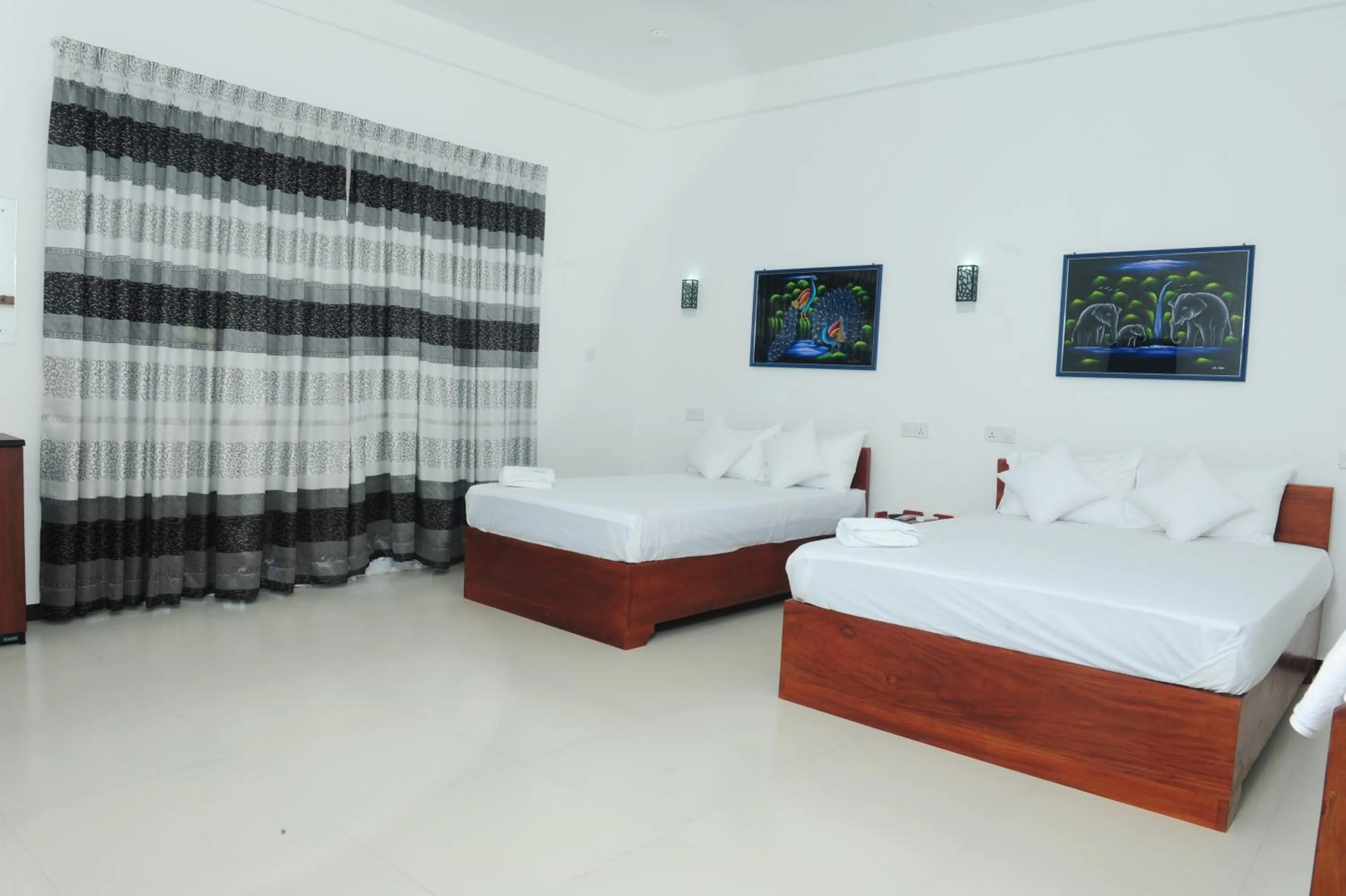 Photo of the whole room, Bed in Sunstar Nilaveli