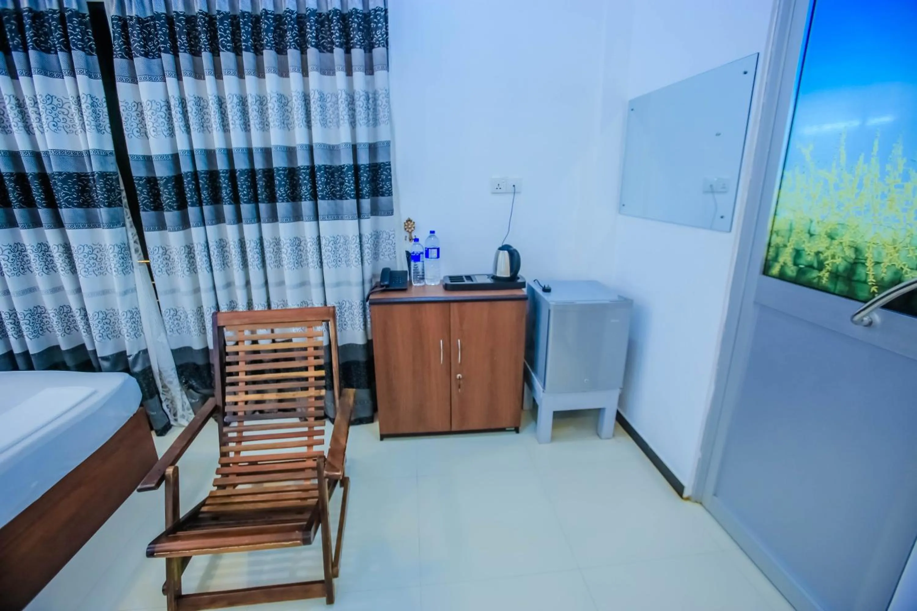 Living room, Bed in Sunstar Nilaveli