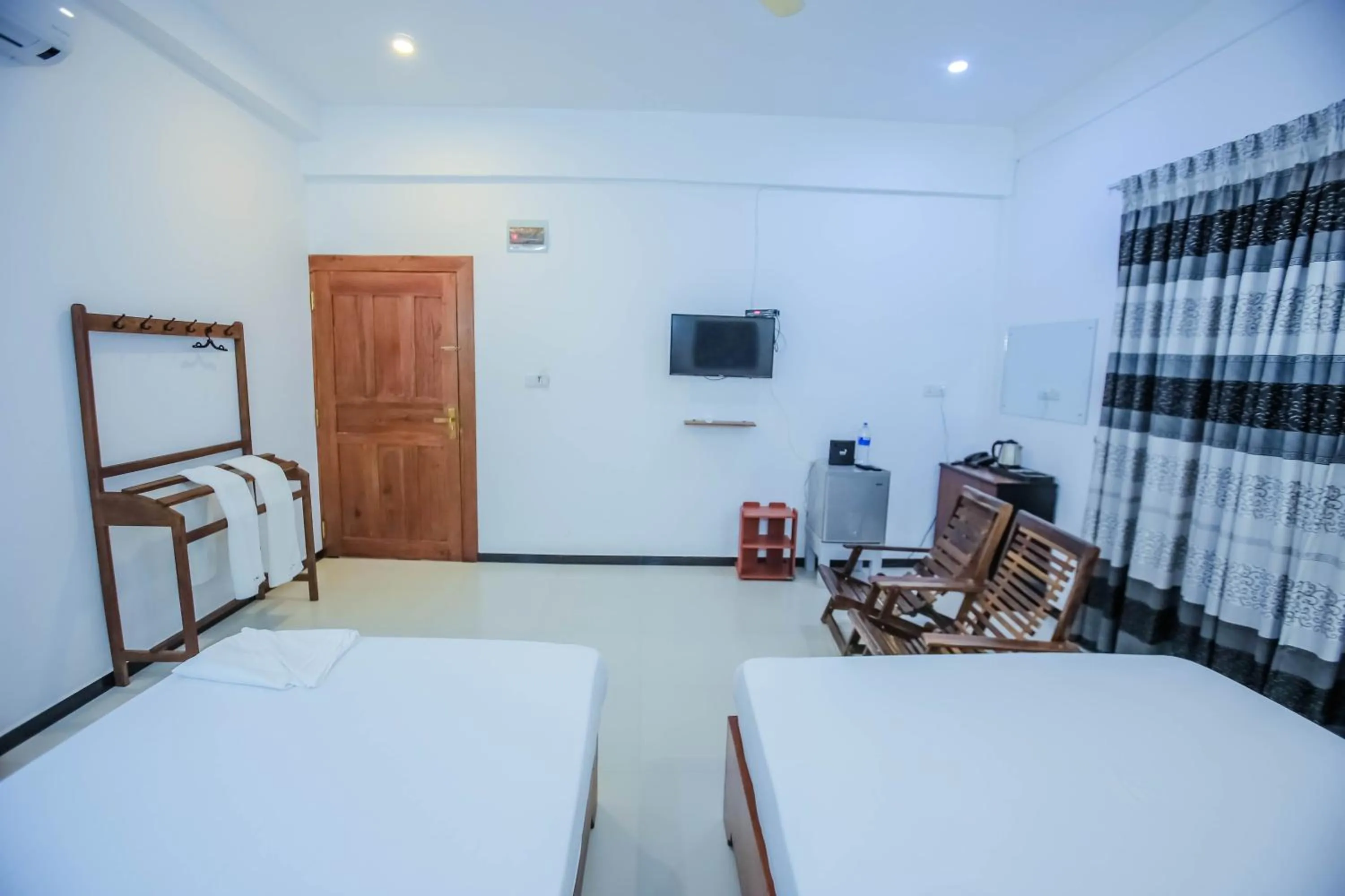 Photo of the whole room, Bed in Sunstar Nilaveli