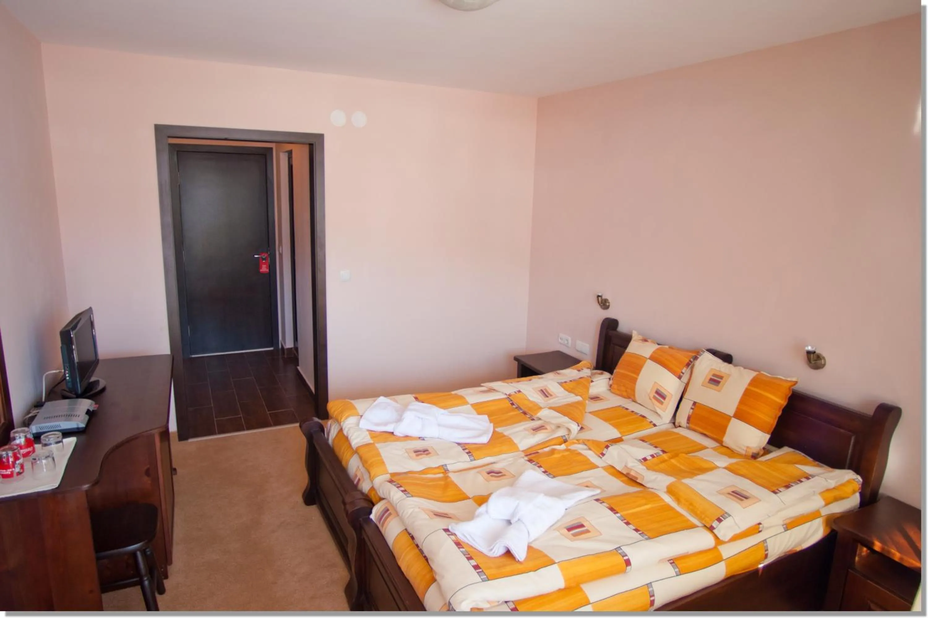 Bed in Family hotel Iskar