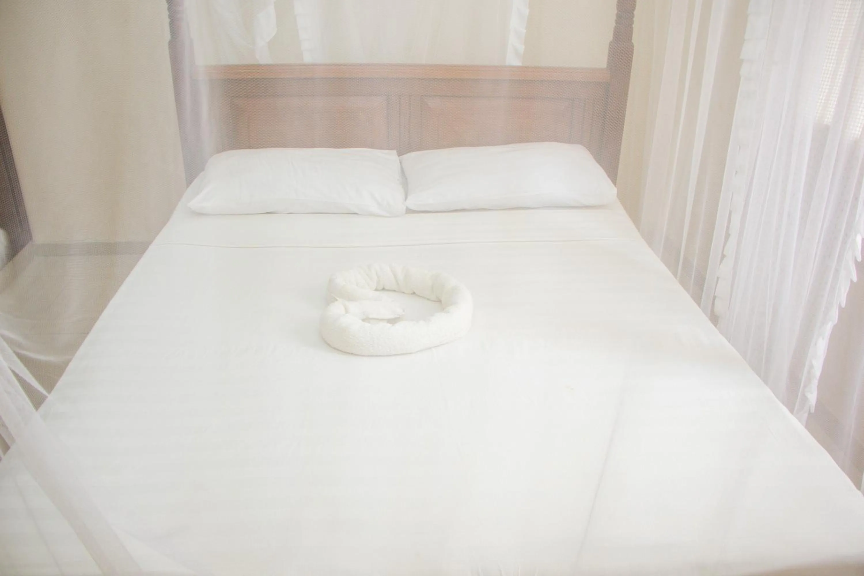 Bed in Nightingale Apartments Hotel Mombasa
