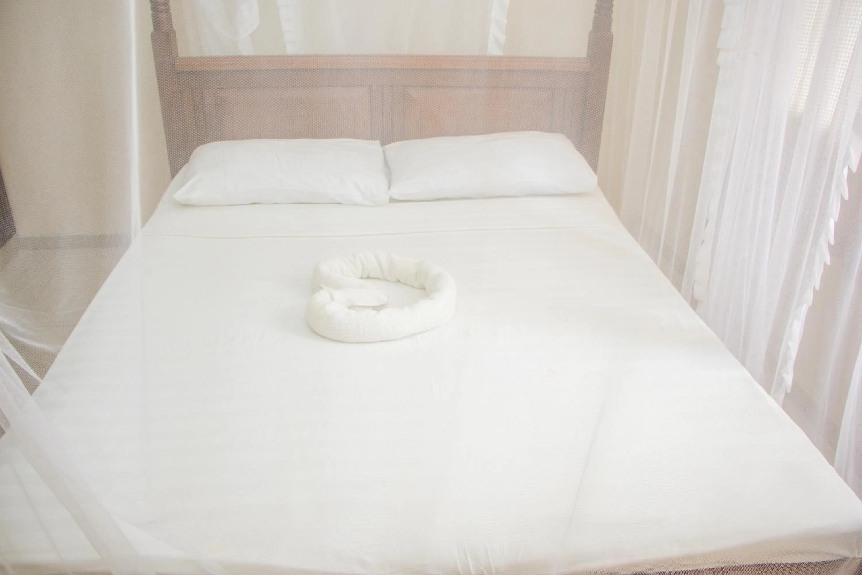 Bed in Nightingale Apartments Hotel Mombasa