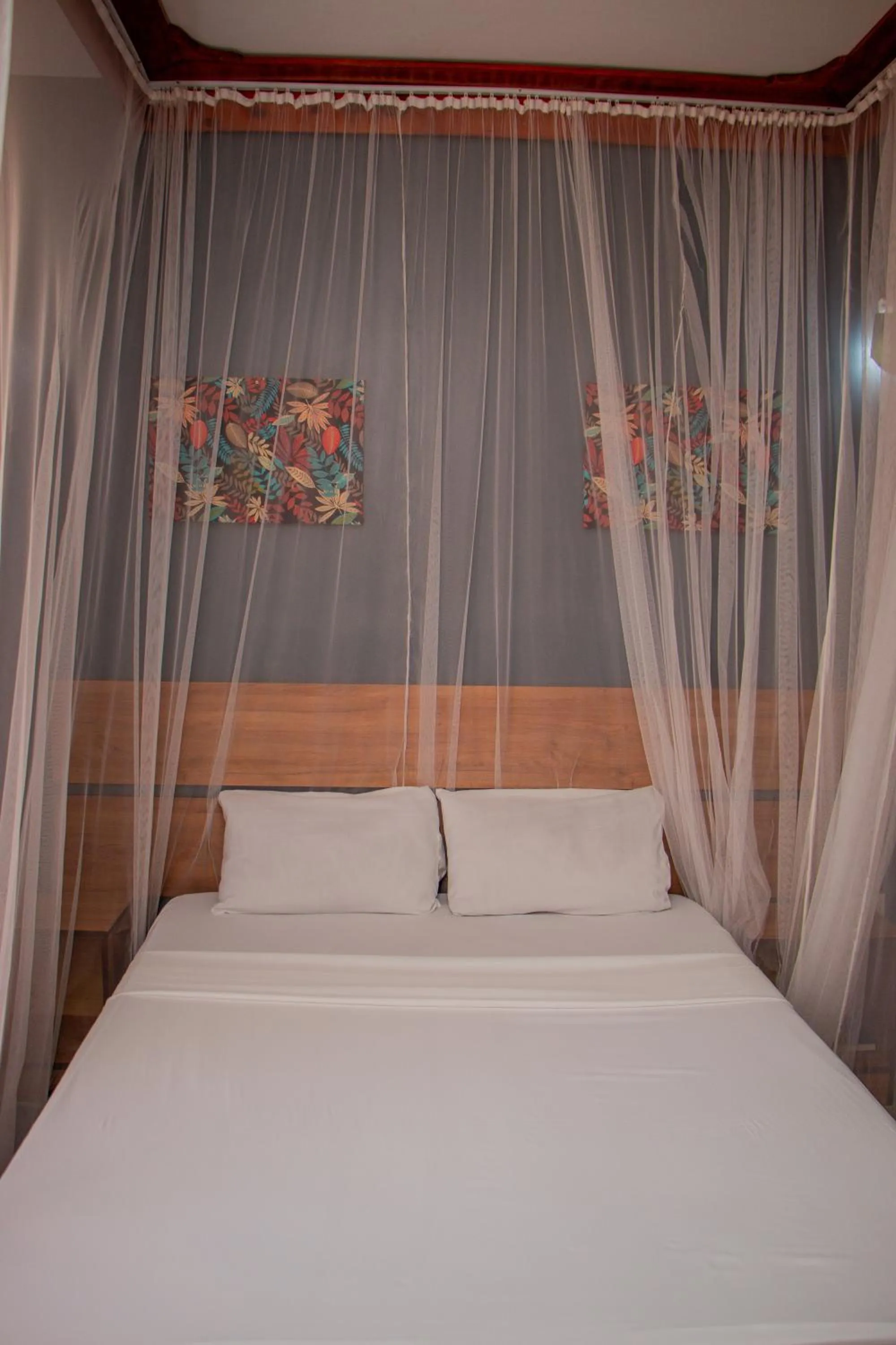 Bed in Nightingale Apartments Hotel Mombasa