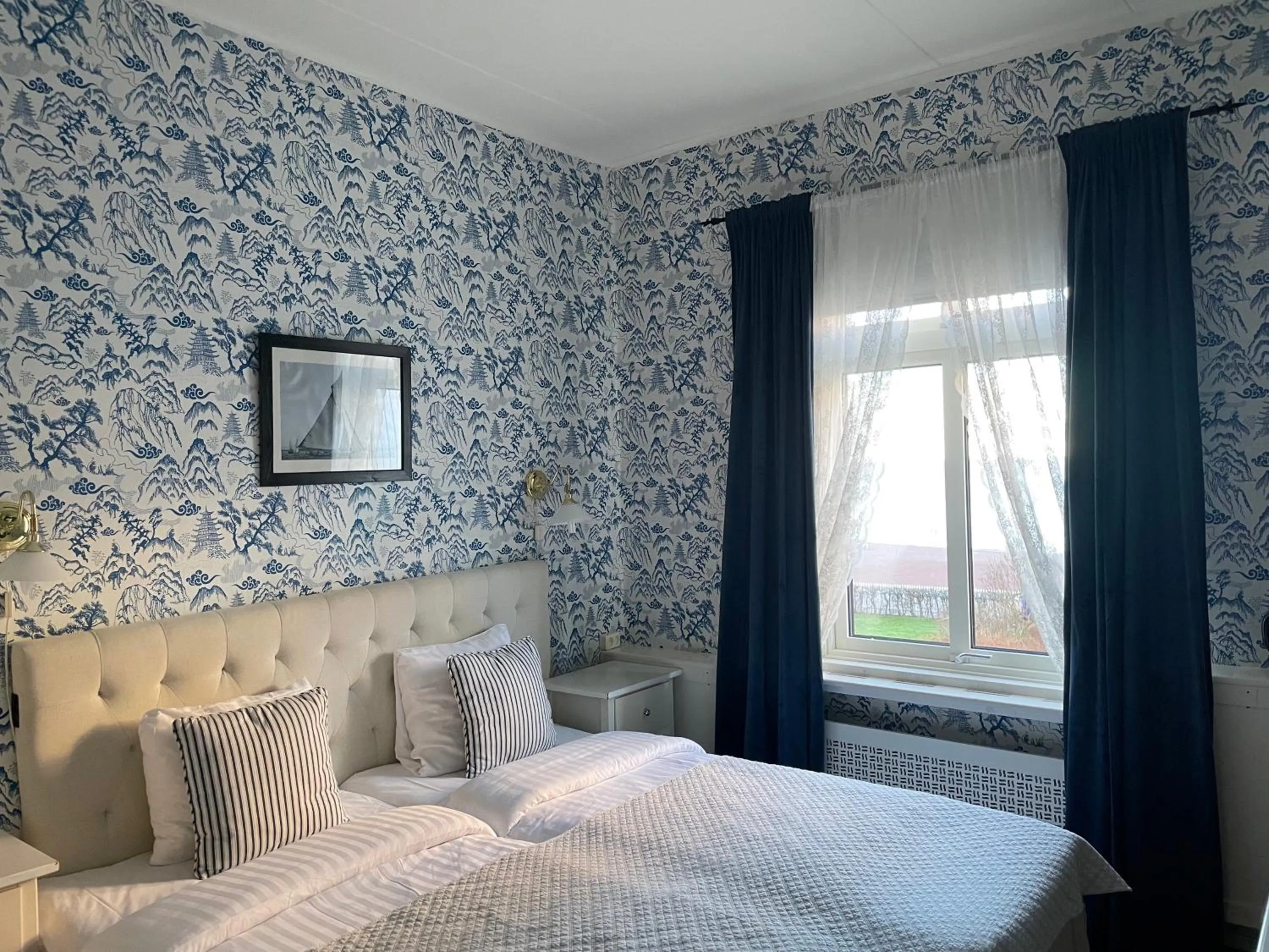 Bed in Nautic Hotell