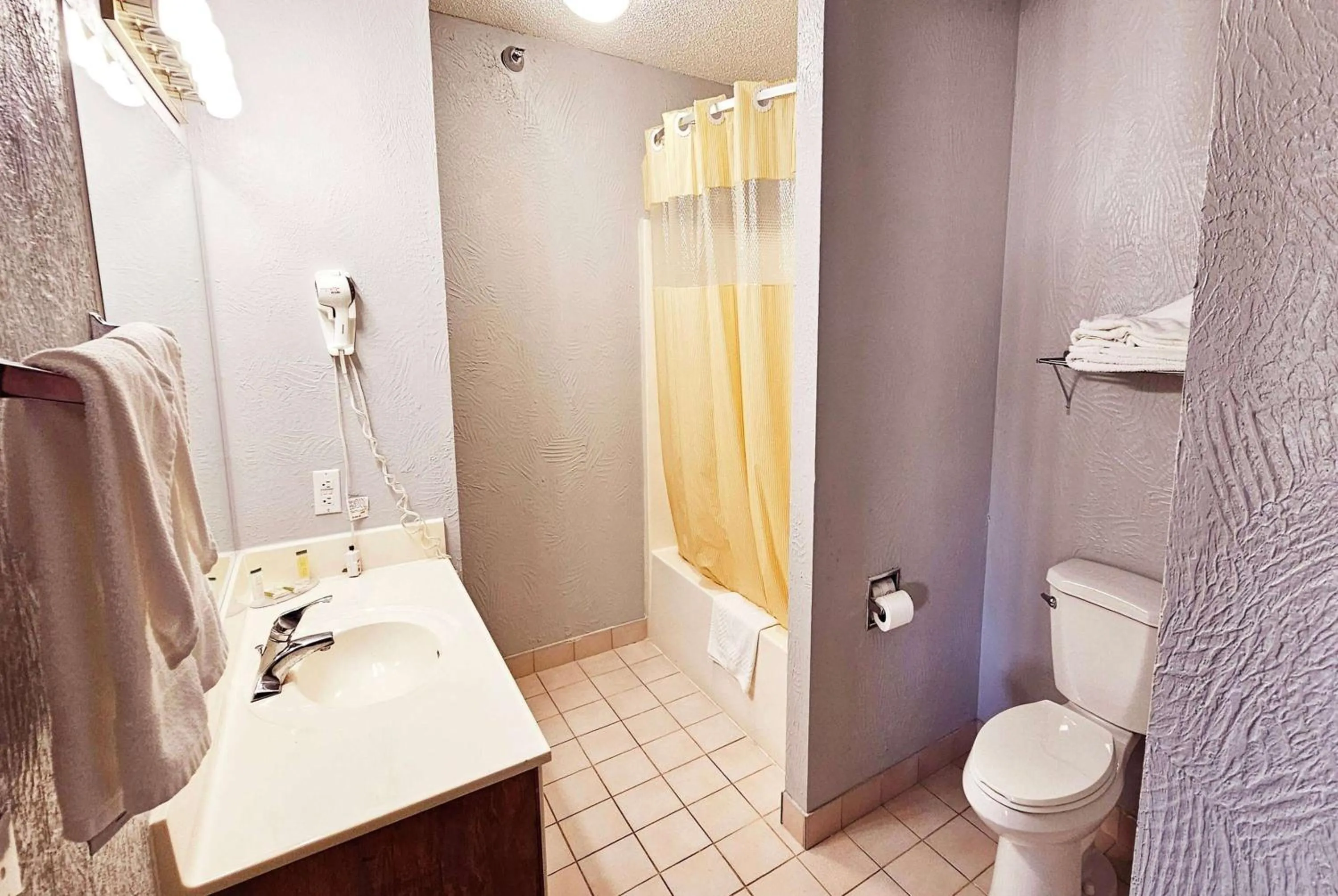 Bathroom in Days Inn by Wyndham Ozark Springfield