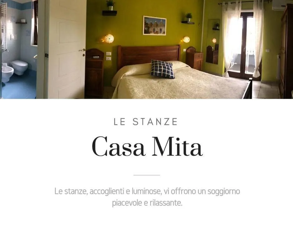 Property logo or sign, Bed in Casa Mita