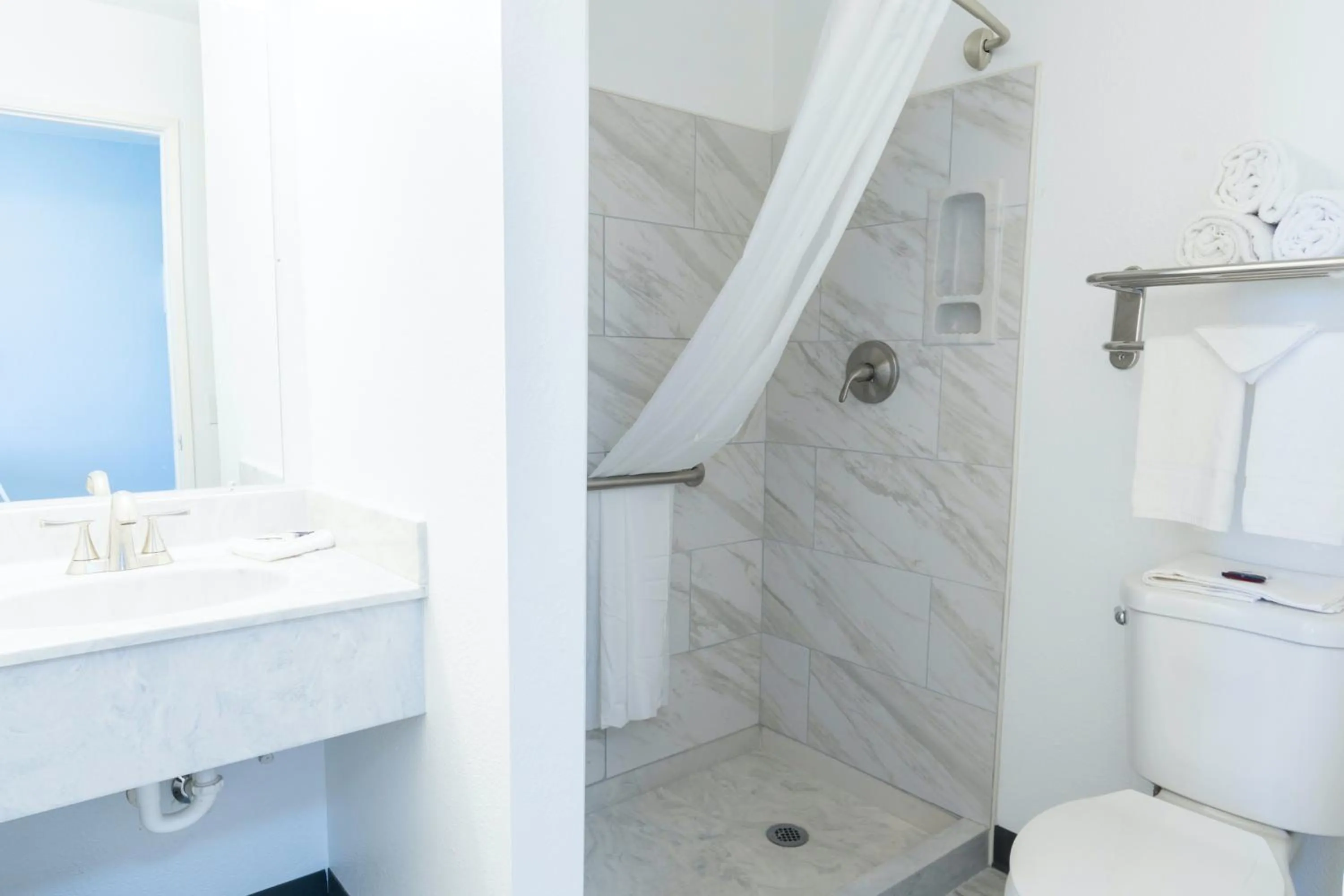 Bathroom in Americas Best Value Inn East Peoria