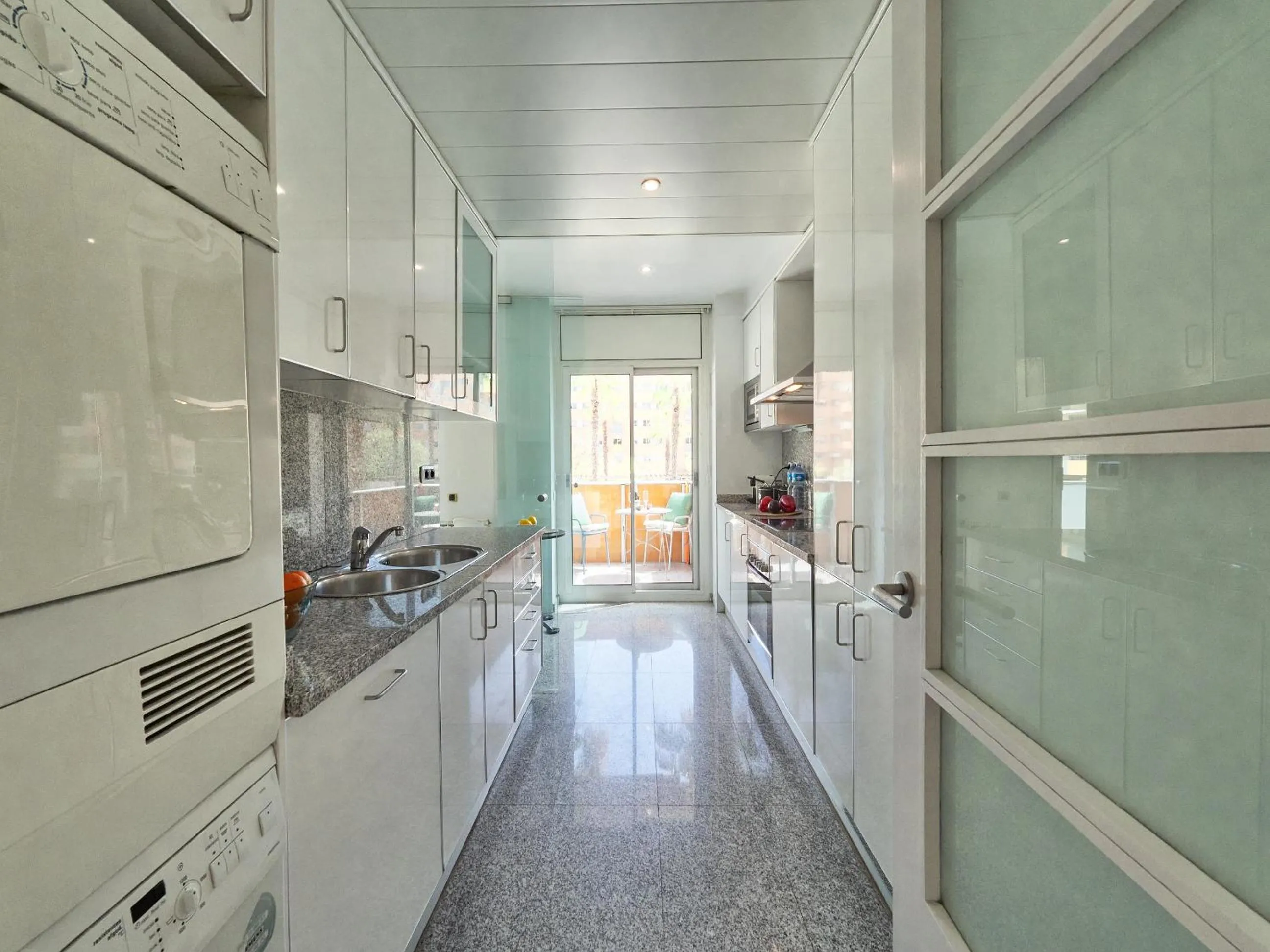 Kitchen or kitchenette in BarcelonaForRent Vila Olimpica Pool Suites