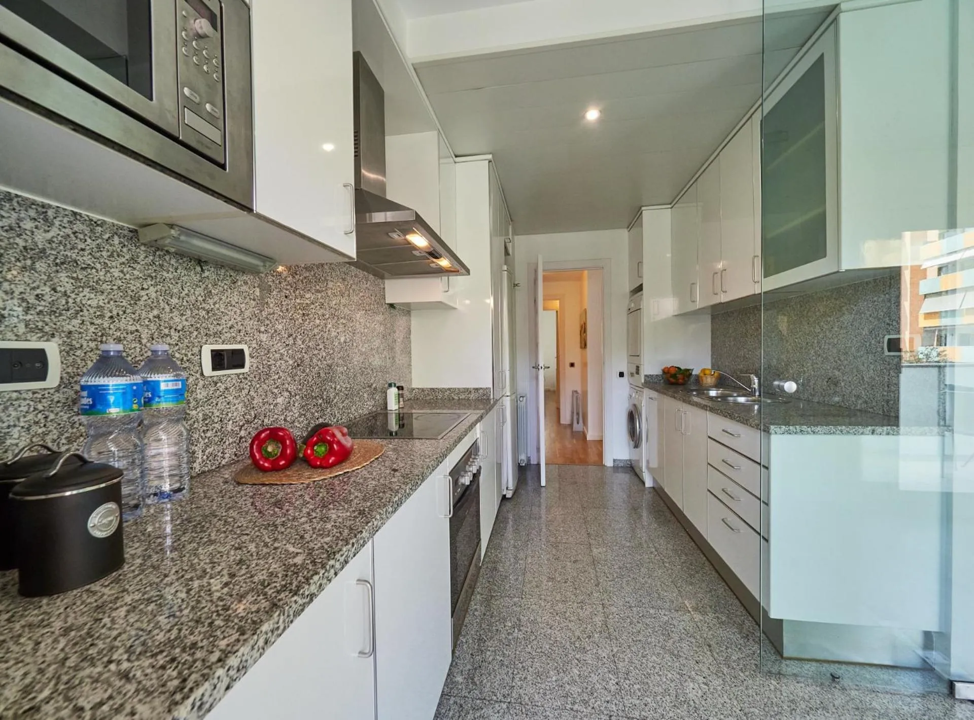 Kitchen or kitchenette in BarcelonaForRent Vila Olimpica Pool Suites