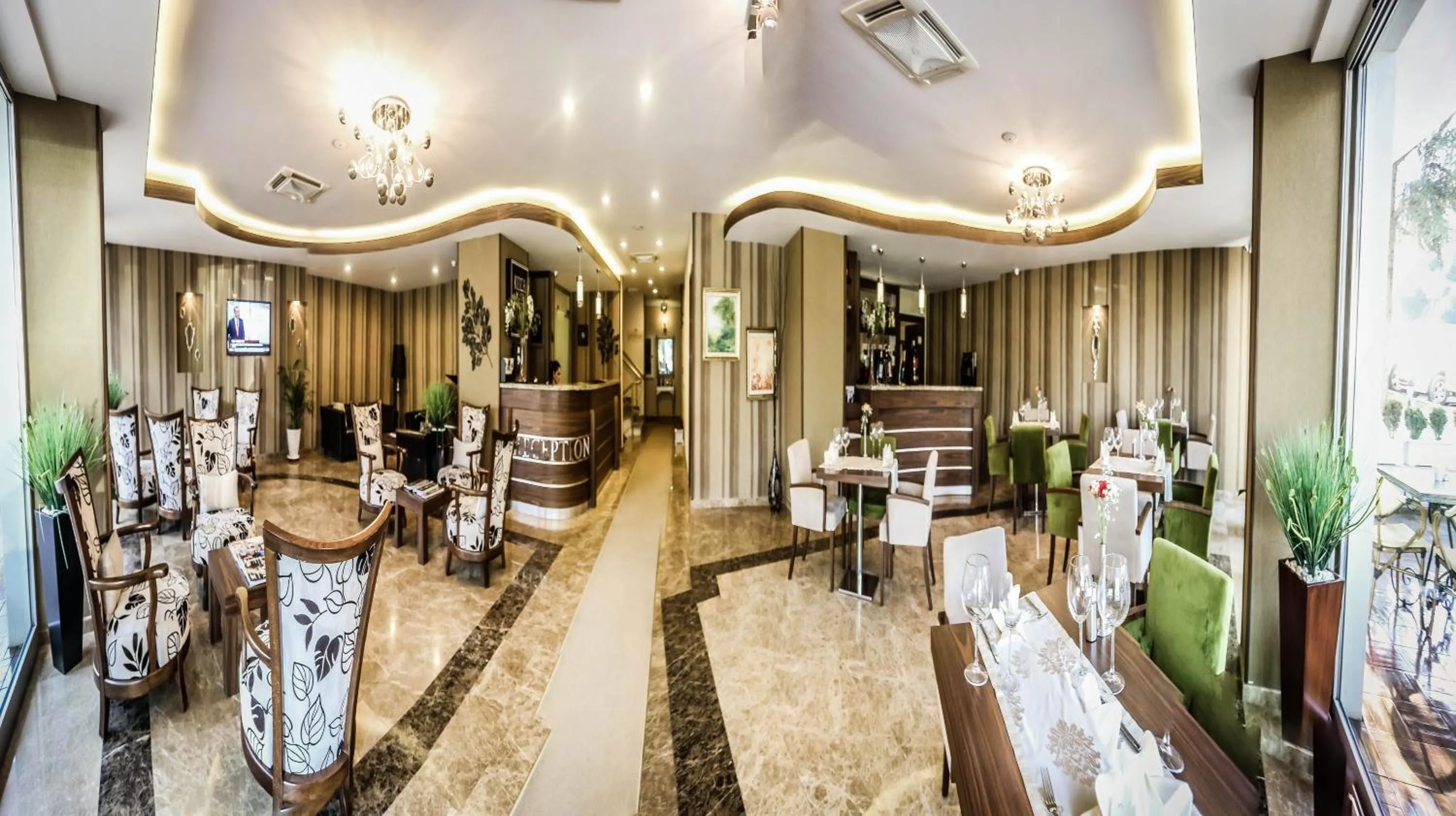 Lobby or reception in Koza Suite Hotel