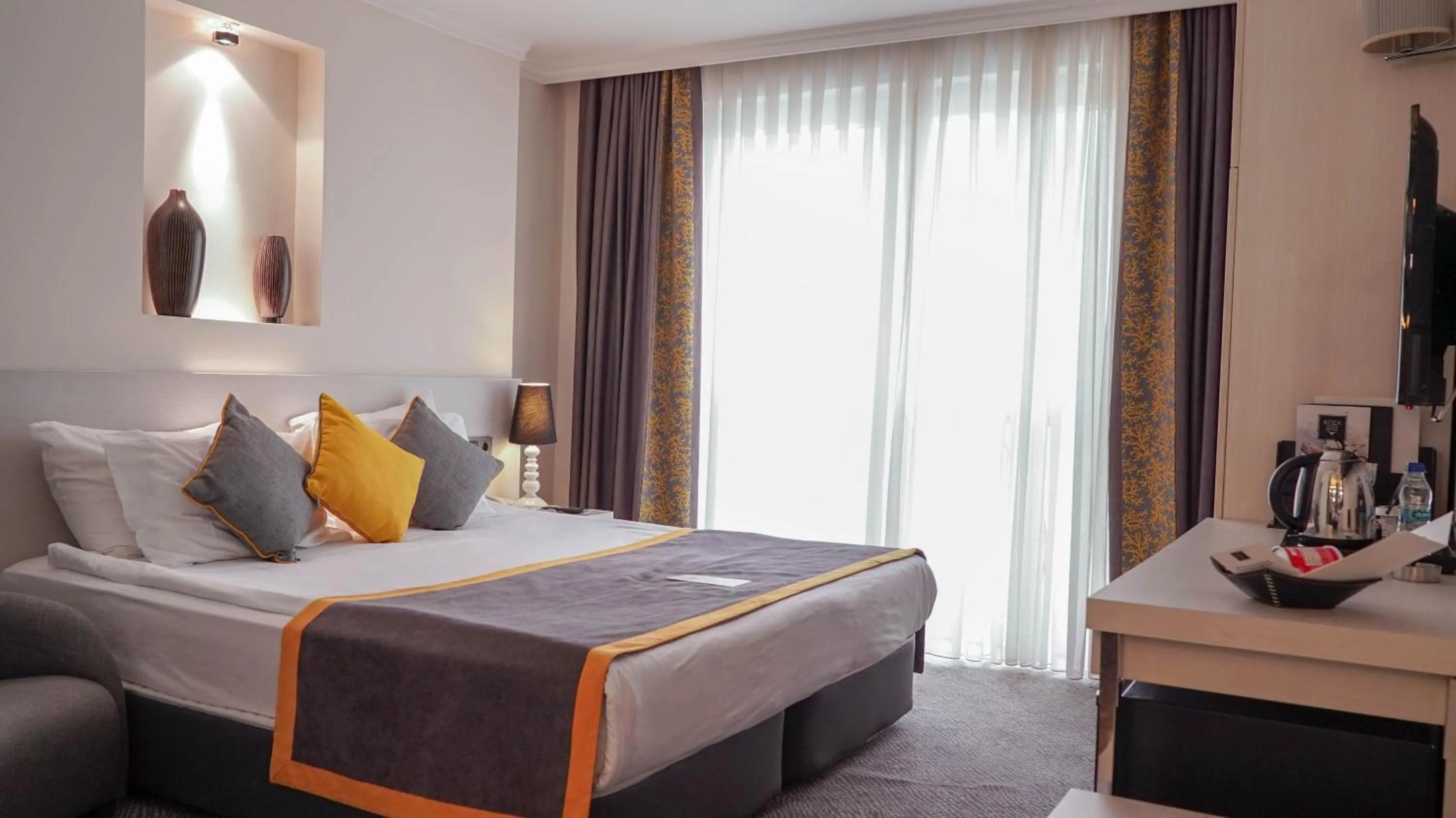 Bed in Koza Suite Hotel