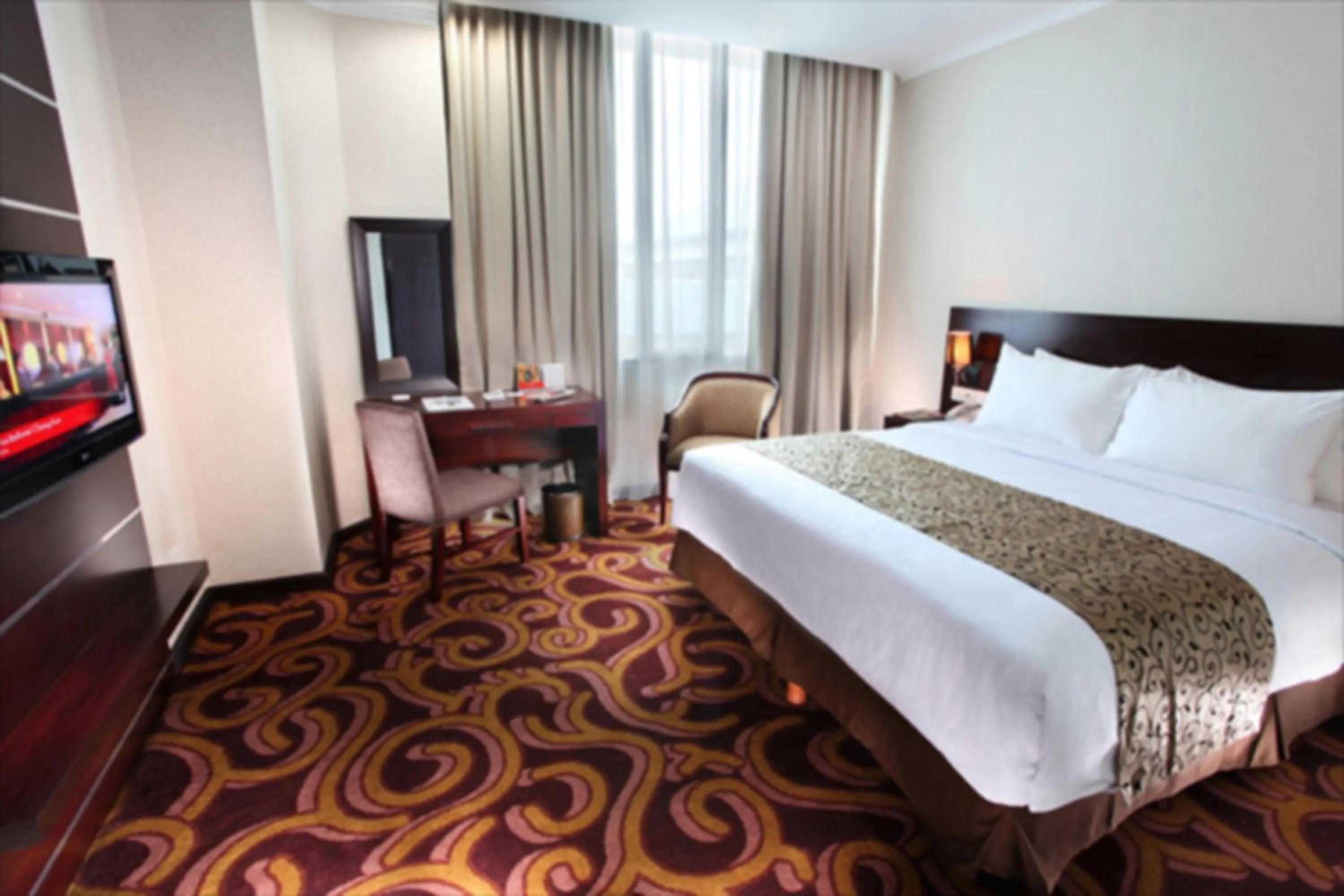 Bed in Swiss-Belhotel Merauke