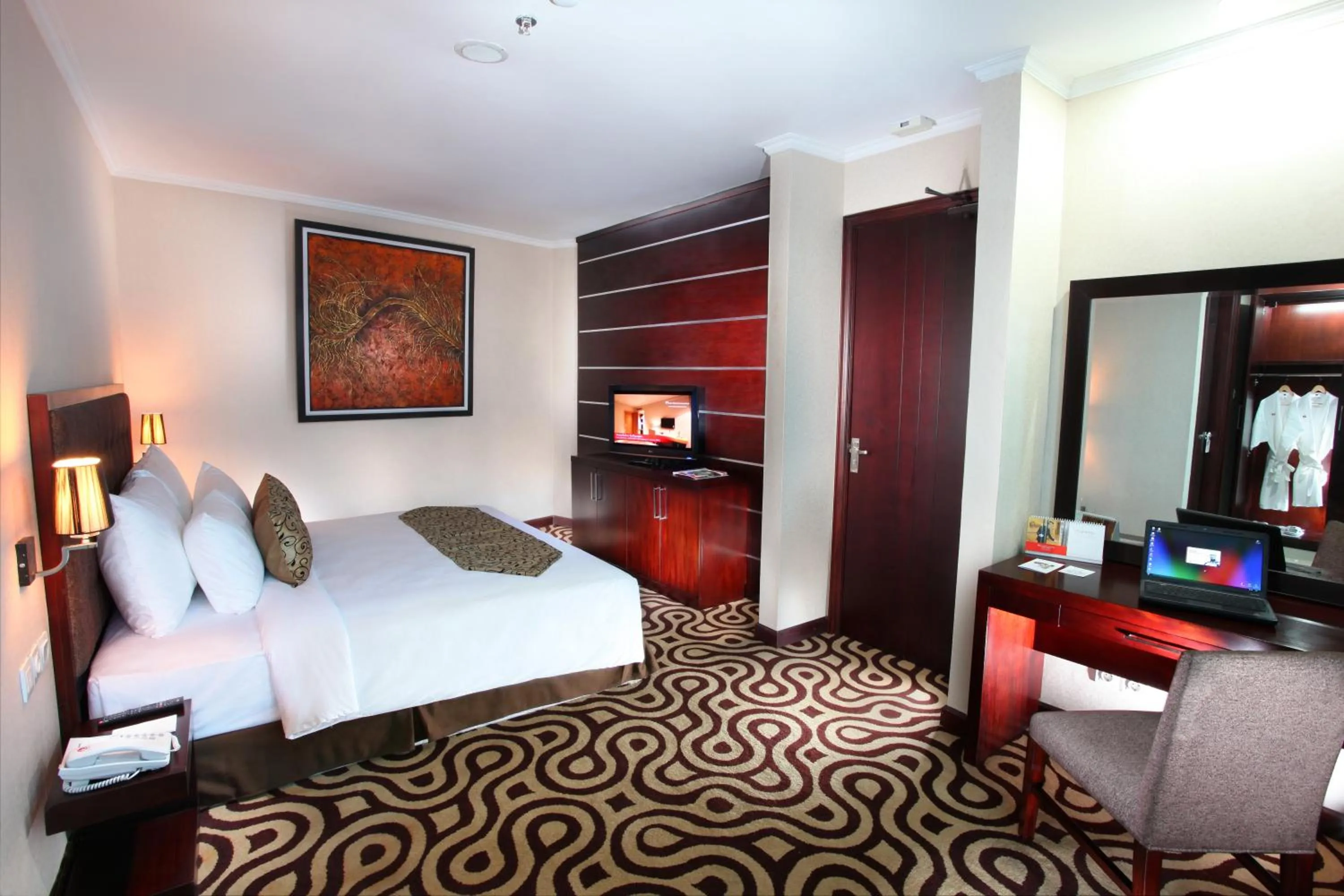 Bed in Swiss-Belhotel Merauke