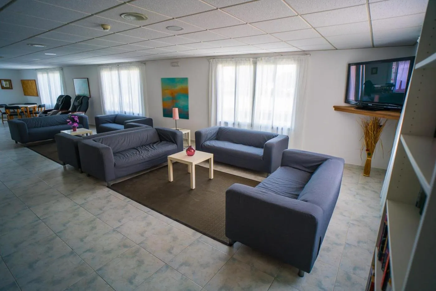 Communal lounge/ TV room in Hotel Sur