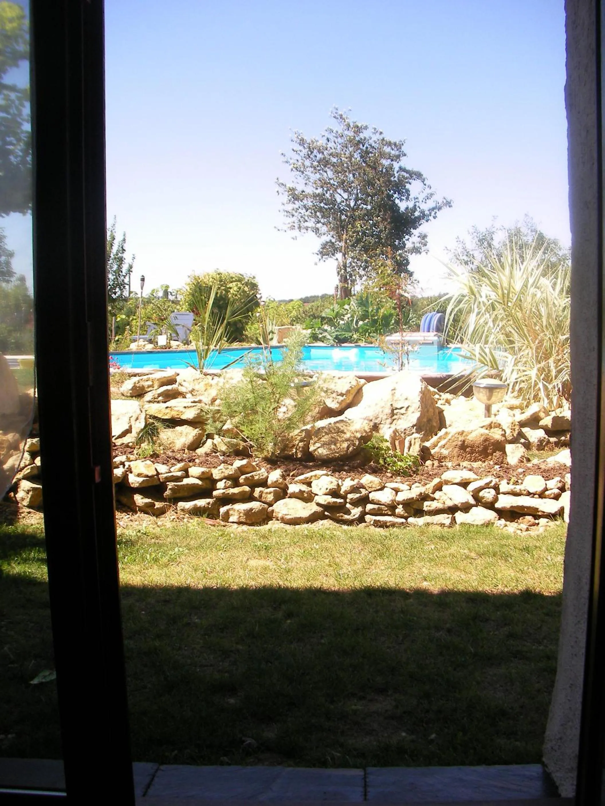 Garden in Chambres d'Hôtes La Vallée des Vignes