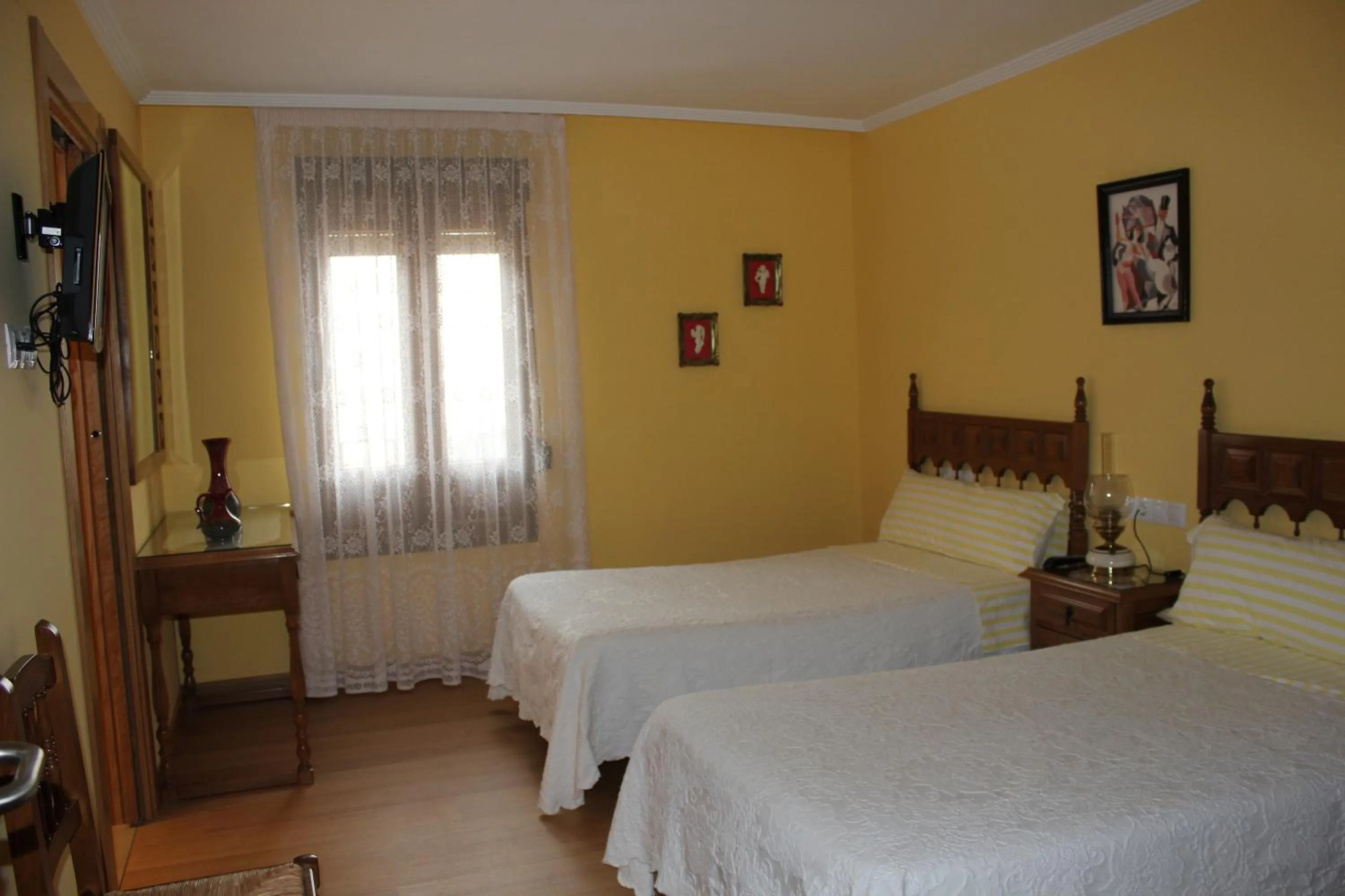 Bed in Hostal Casa Perico