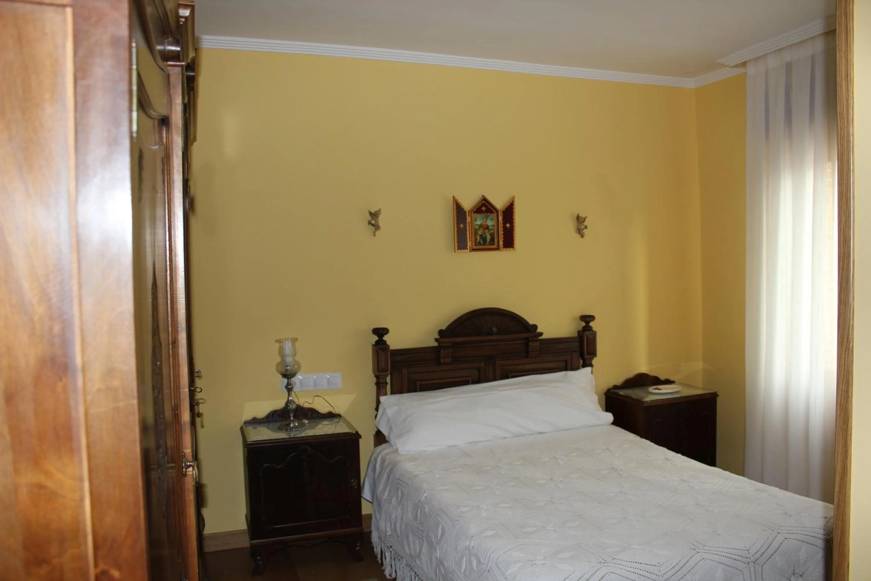 Bed in Hostal Casa Perico