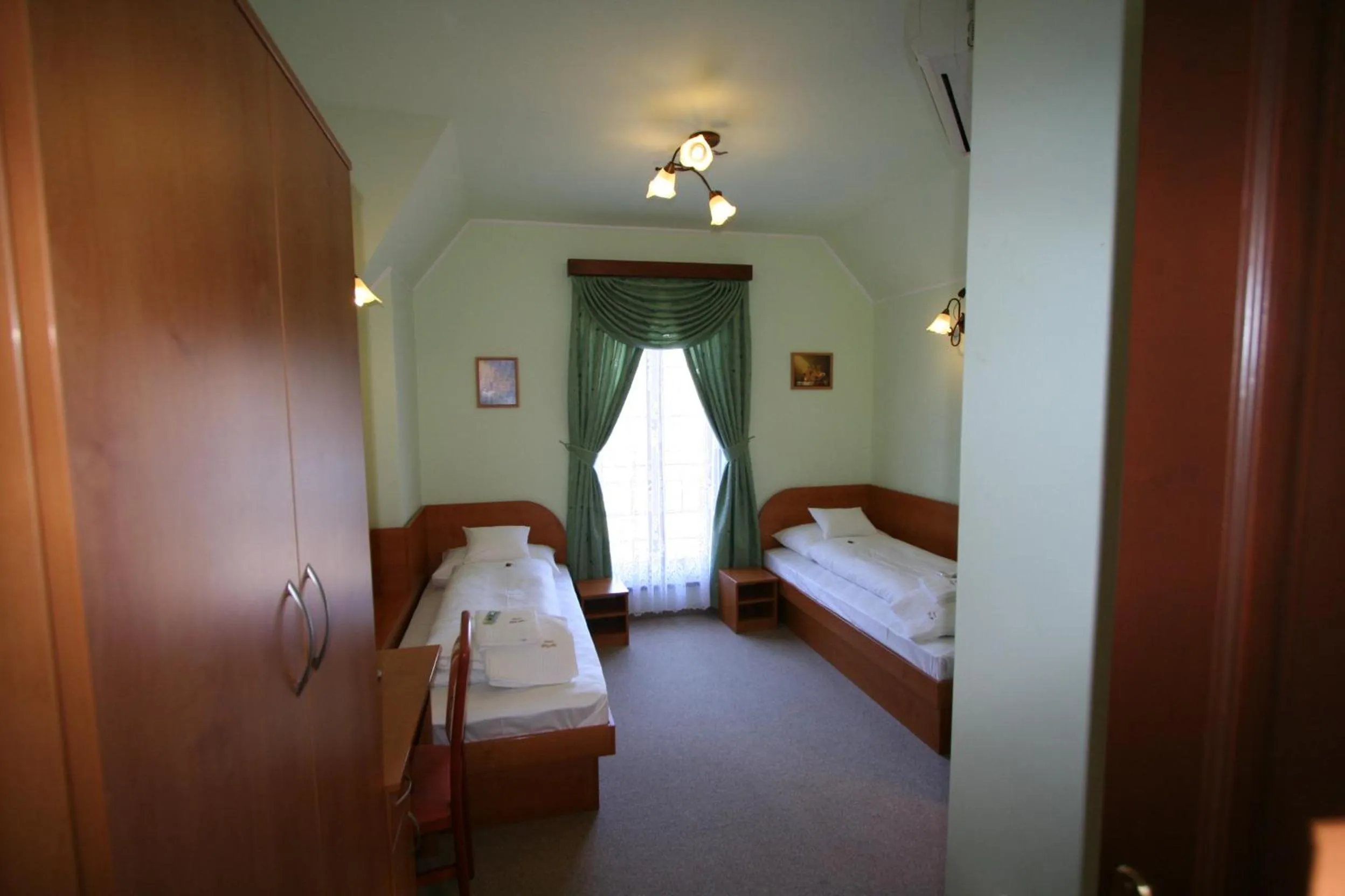 Photo of the whole room, Bed in Penzión Zlatý Jeleň