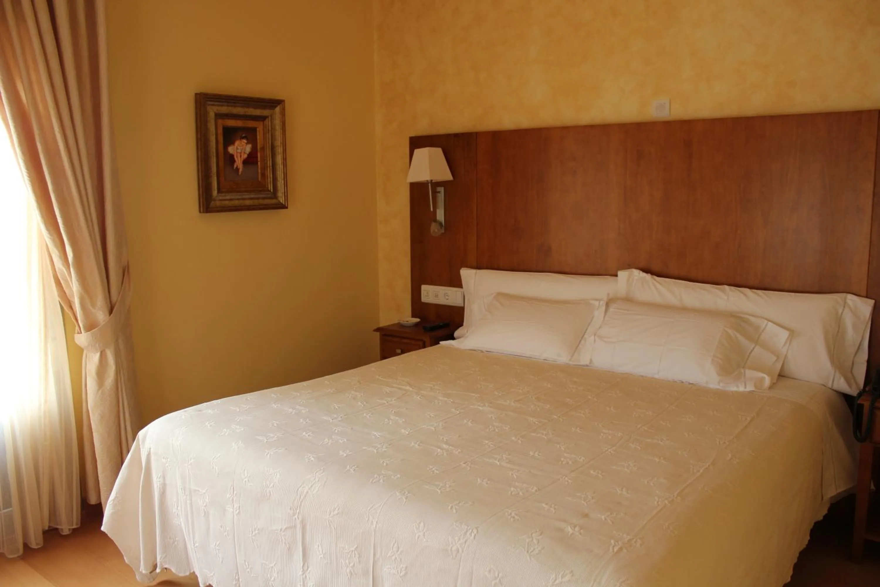 Photo of the whole room, Bed in Hotel Villa de Larraga