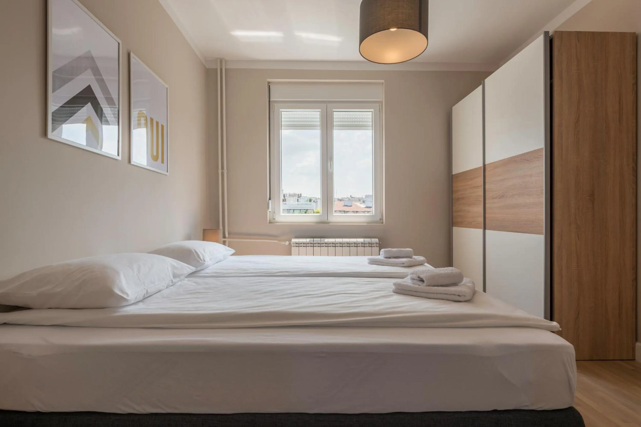 Bed in Urban ZEN with View - City Break Apartments
