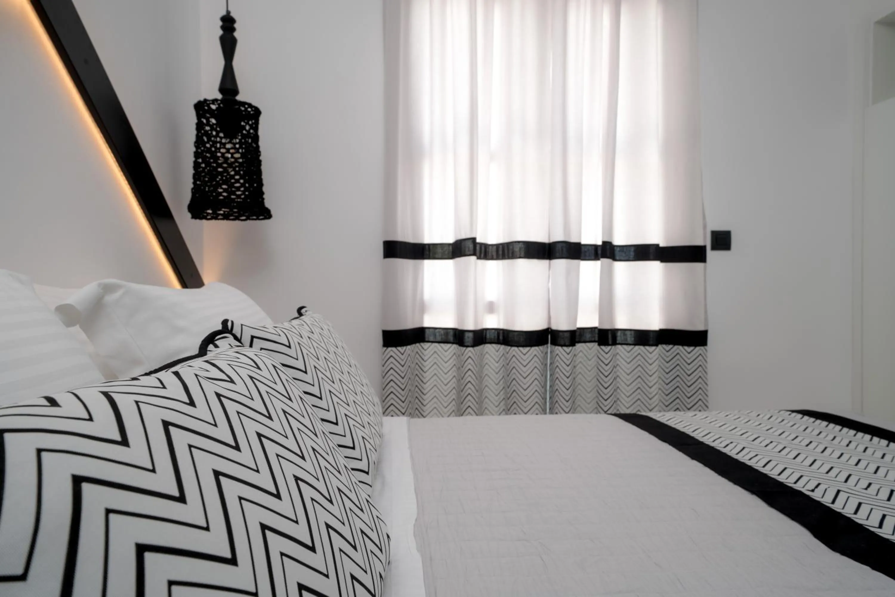 Bed in Divelia Hotel