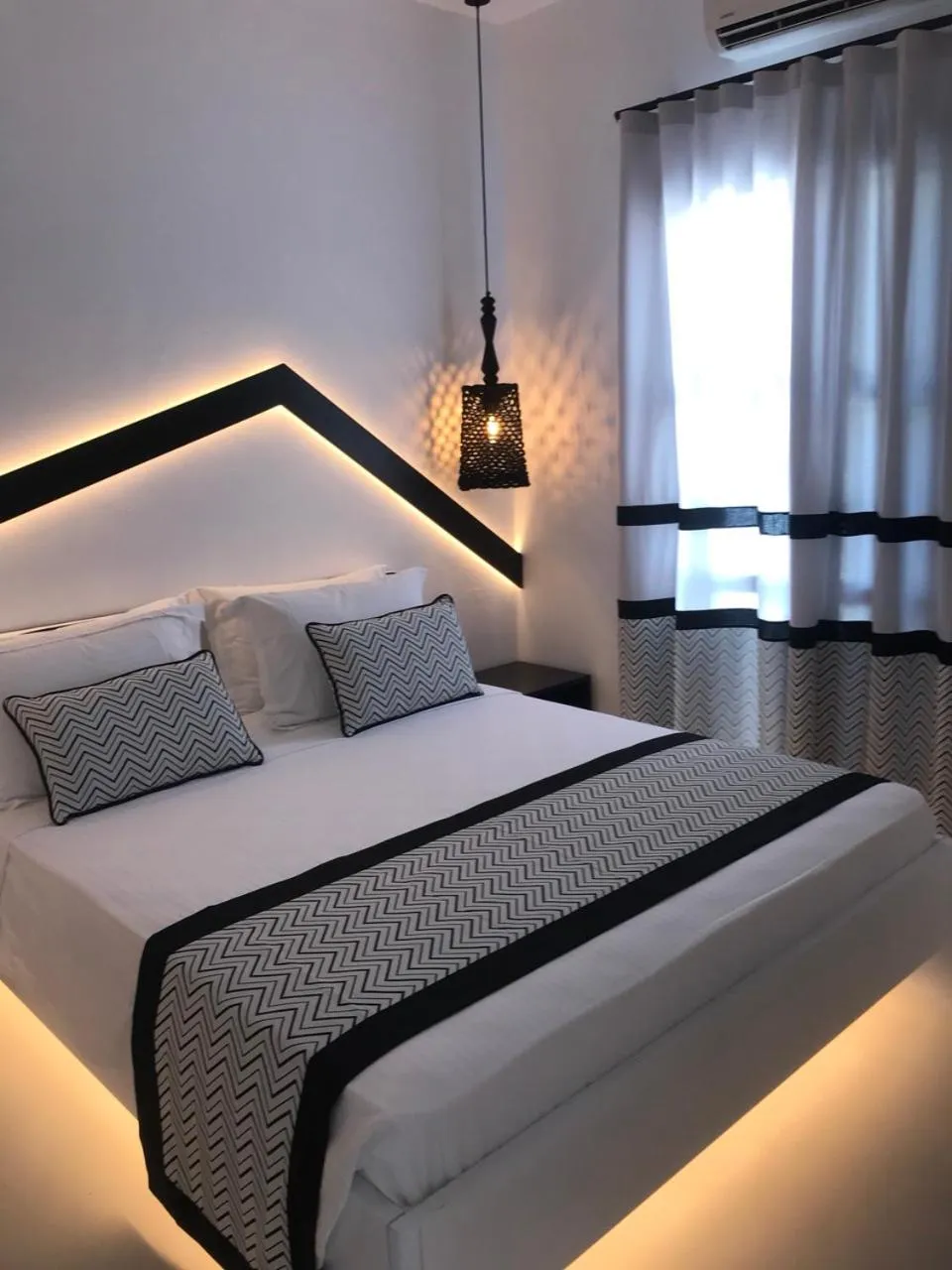 Bed in Divelia Hotel