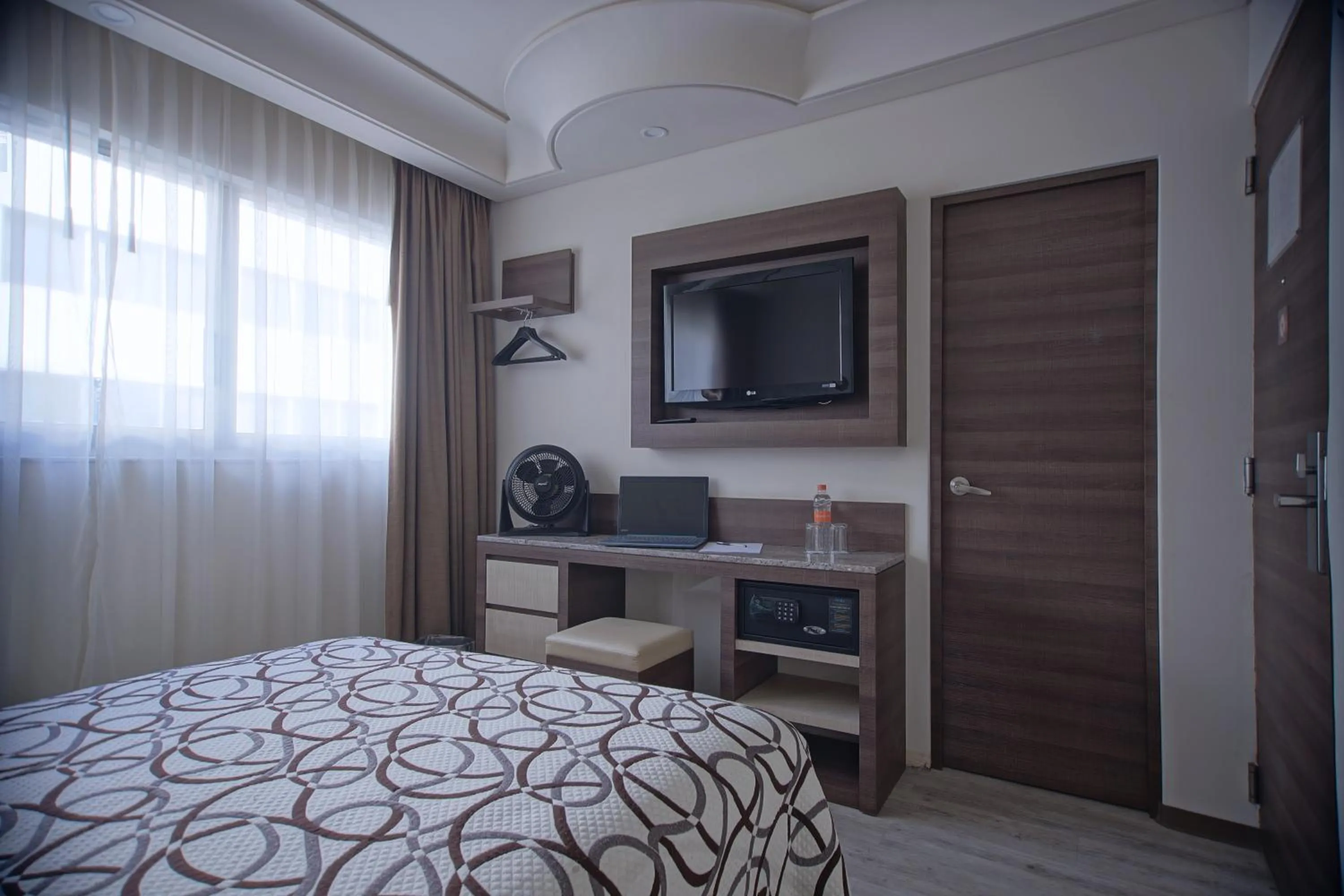 Photo of the whole room, Bed in Econo Express Hotel