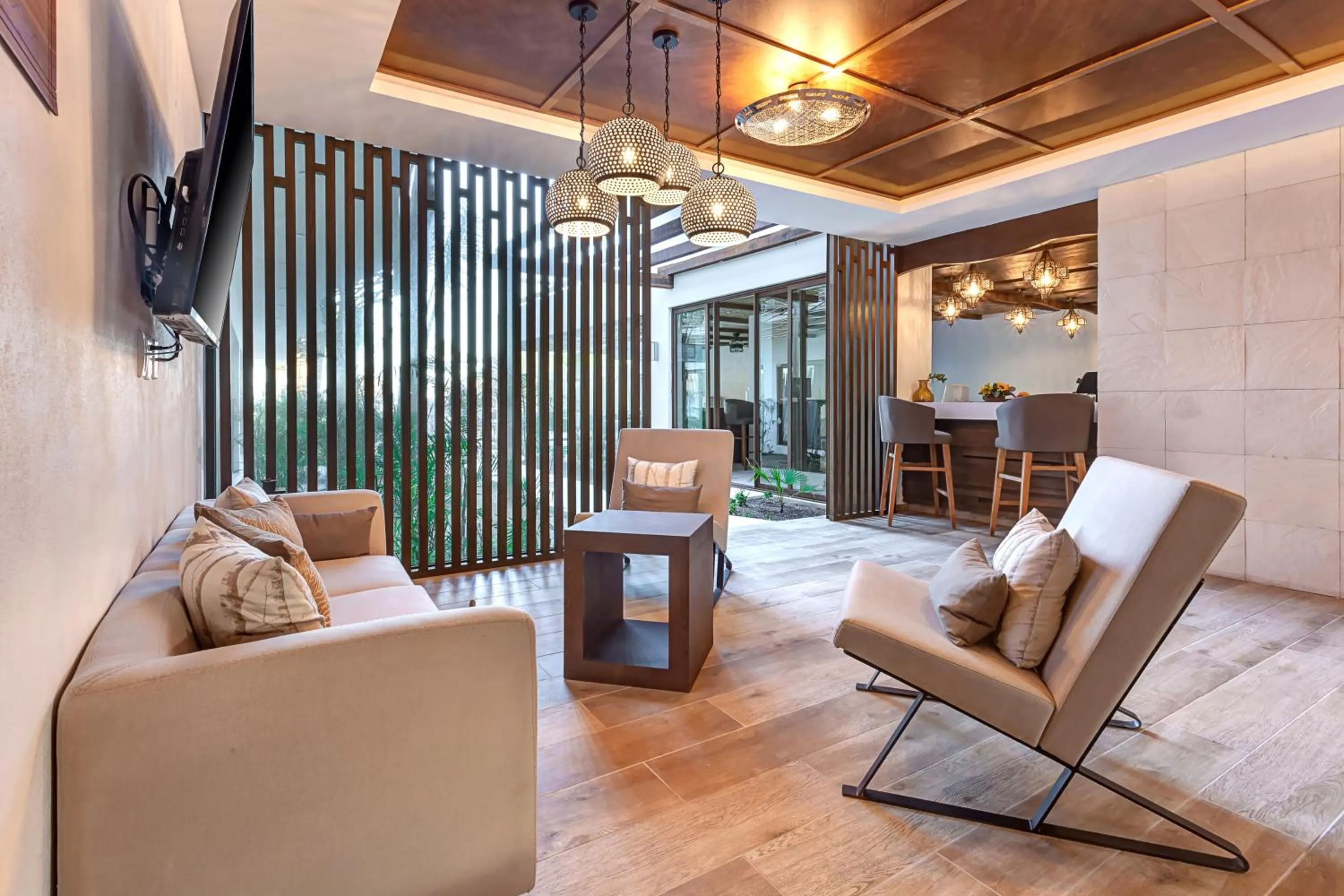 Communal lounge/ TV room in Mystique Holbox by Royalton, A Tribute Portfolio Resort