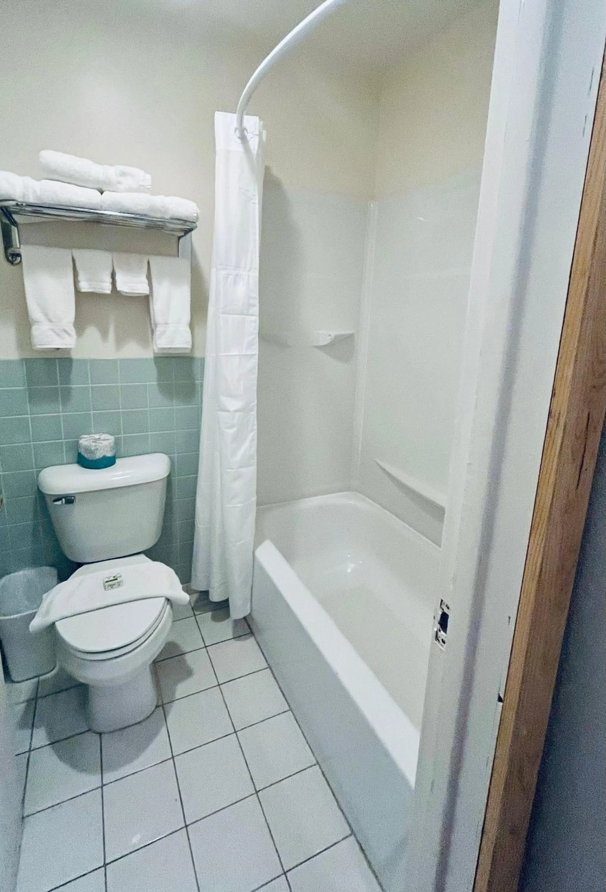 Shower in Americas Best Value Inn Wall