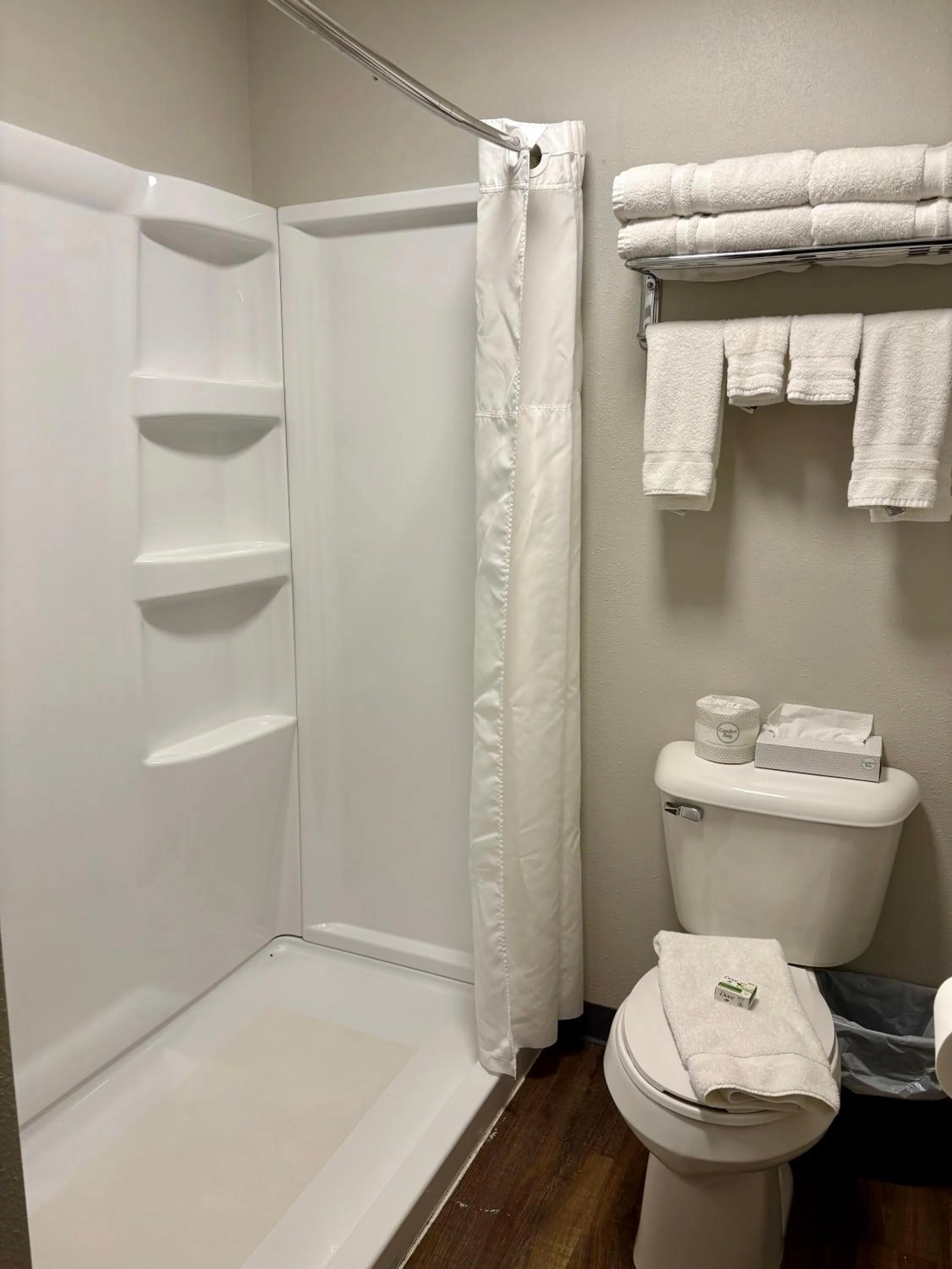 Shower in Americas Best Value Inn Wall