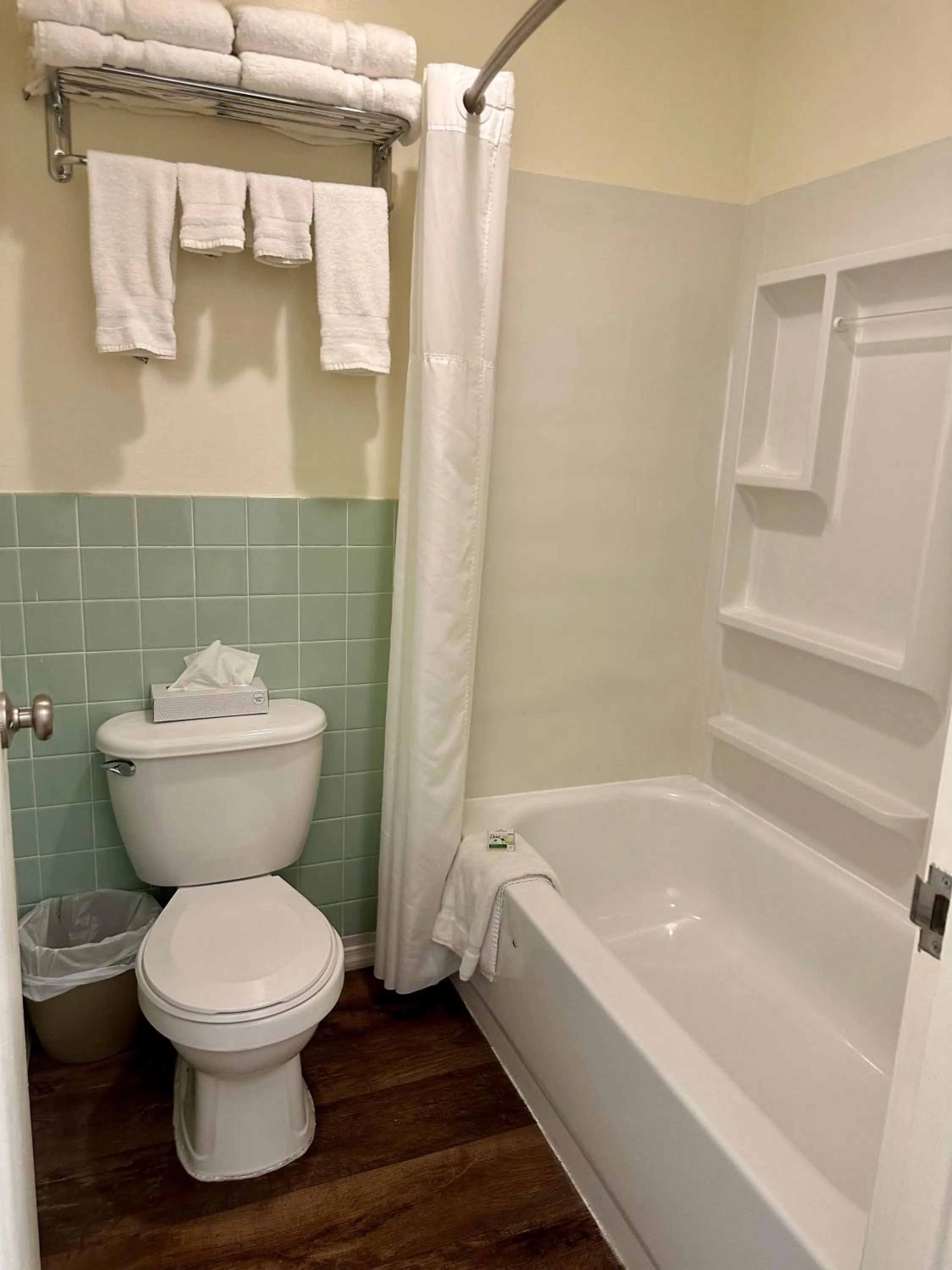 Shower in Americas Best Value Inn Wall