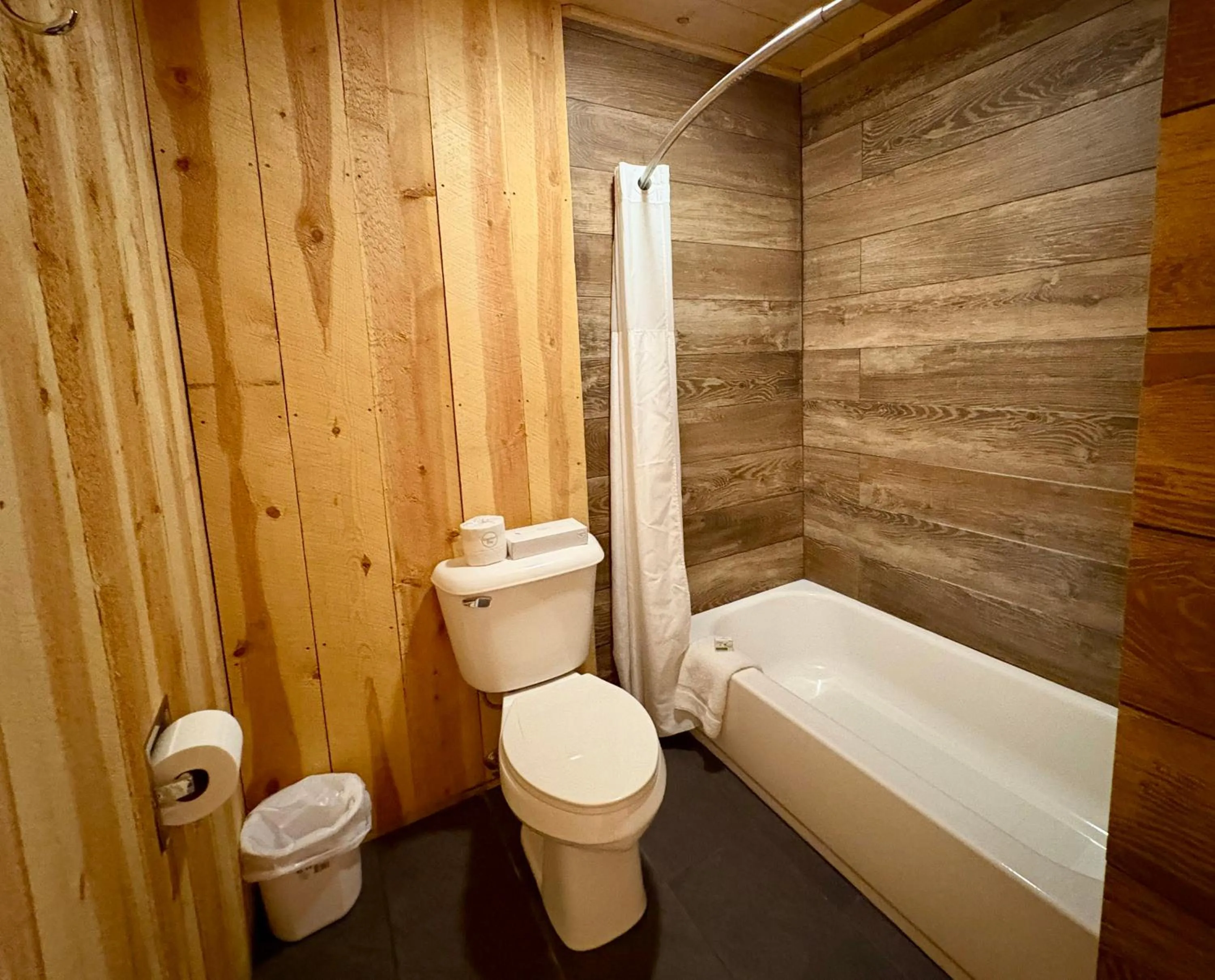 Shower in Americas Best Value Inn Wall