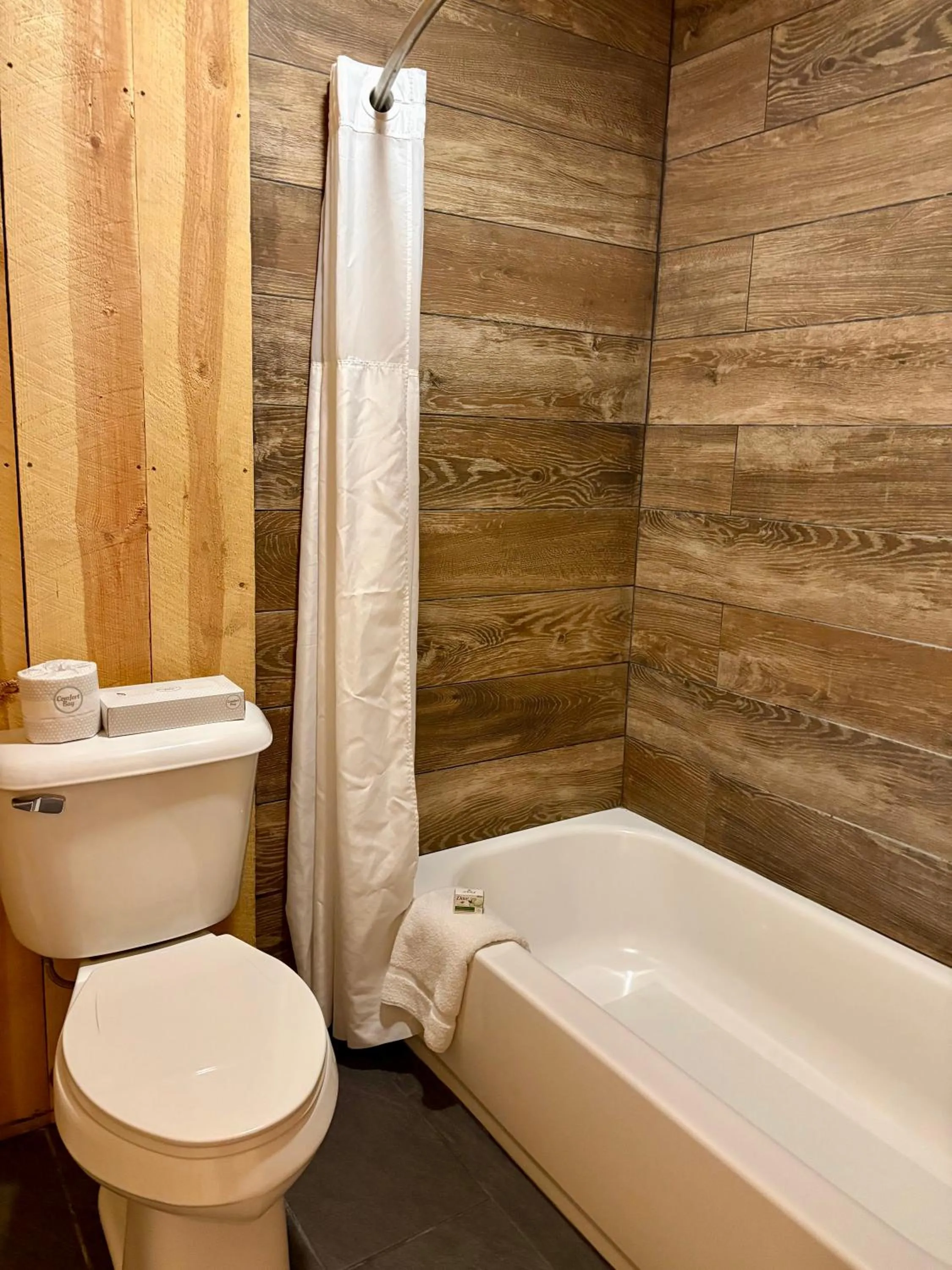 Shower in Americas Best Value Inn Wall