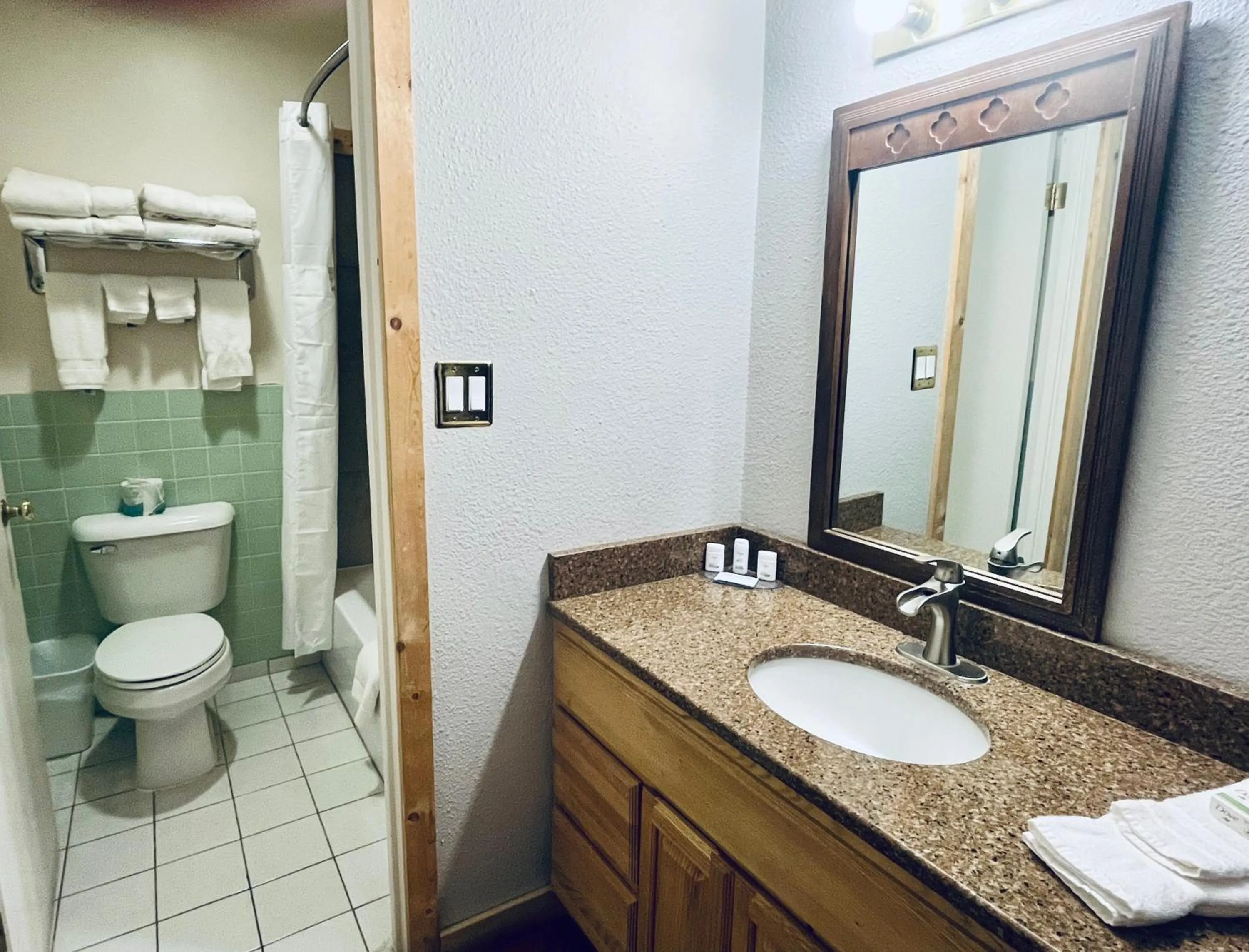 Shower in Americas Best Value Inn Wall