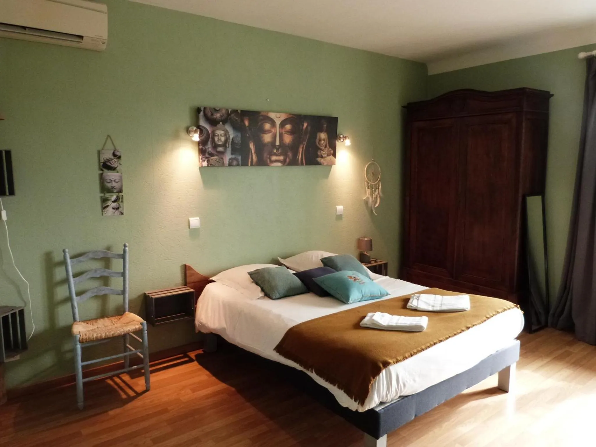 Bed in Logis Hôtel Restaurant La Borie