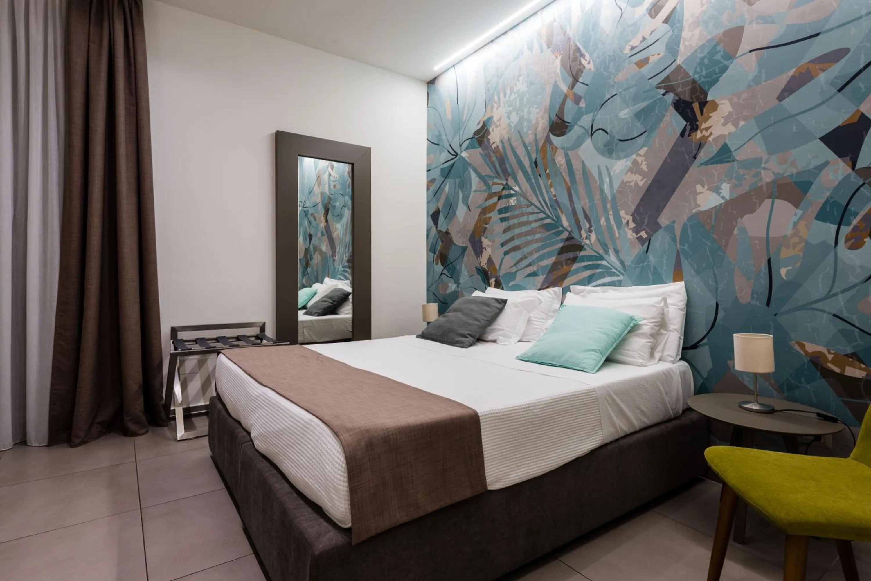 Bed in BeBIGEA Rooms