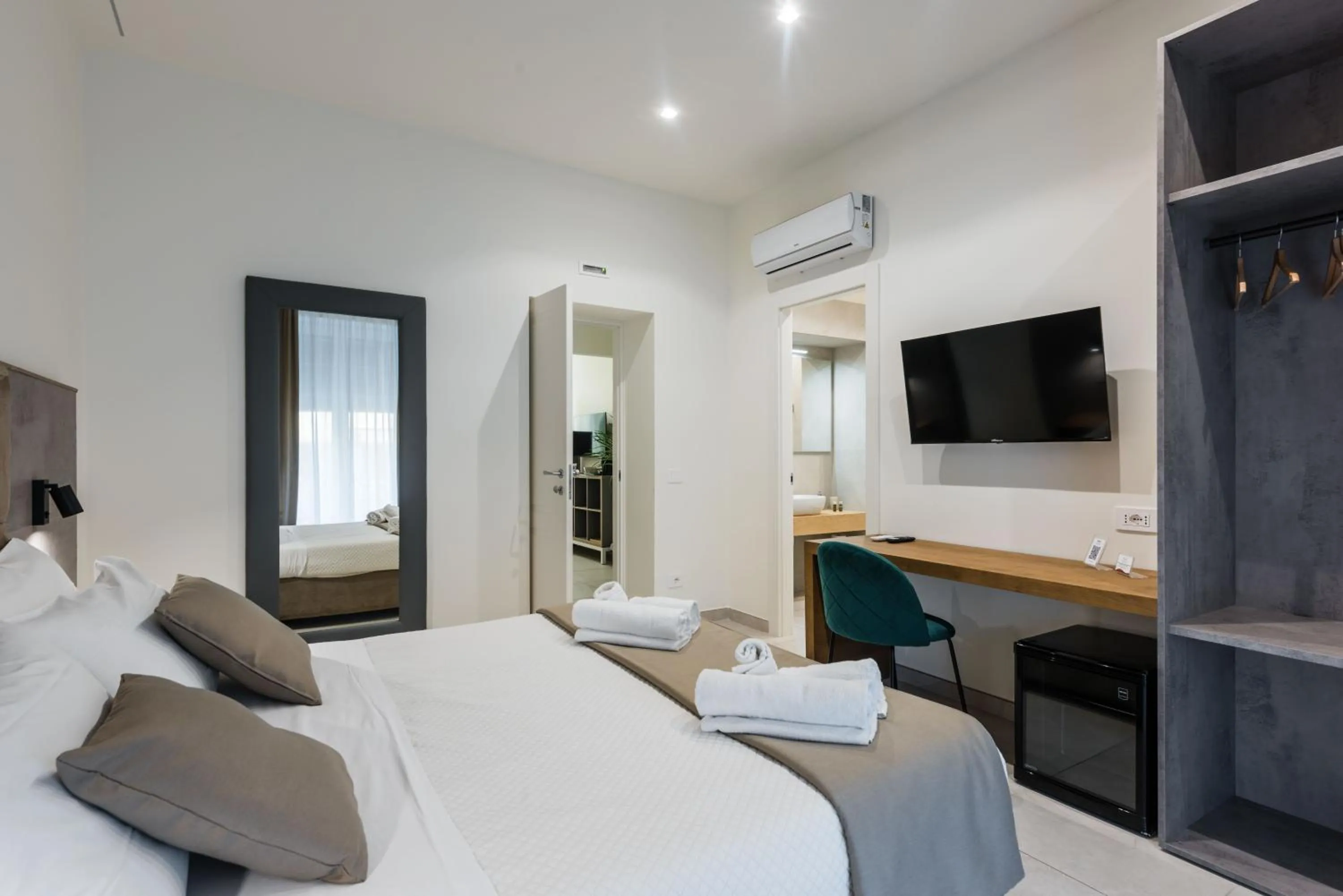 Bed in BeBIGEA Rooms