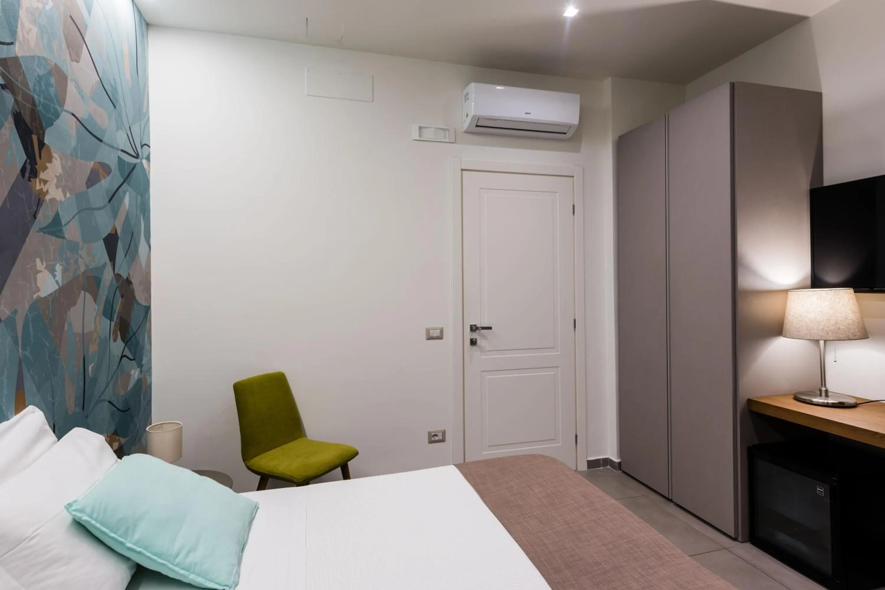 Bed in BeBIGEA Rooms