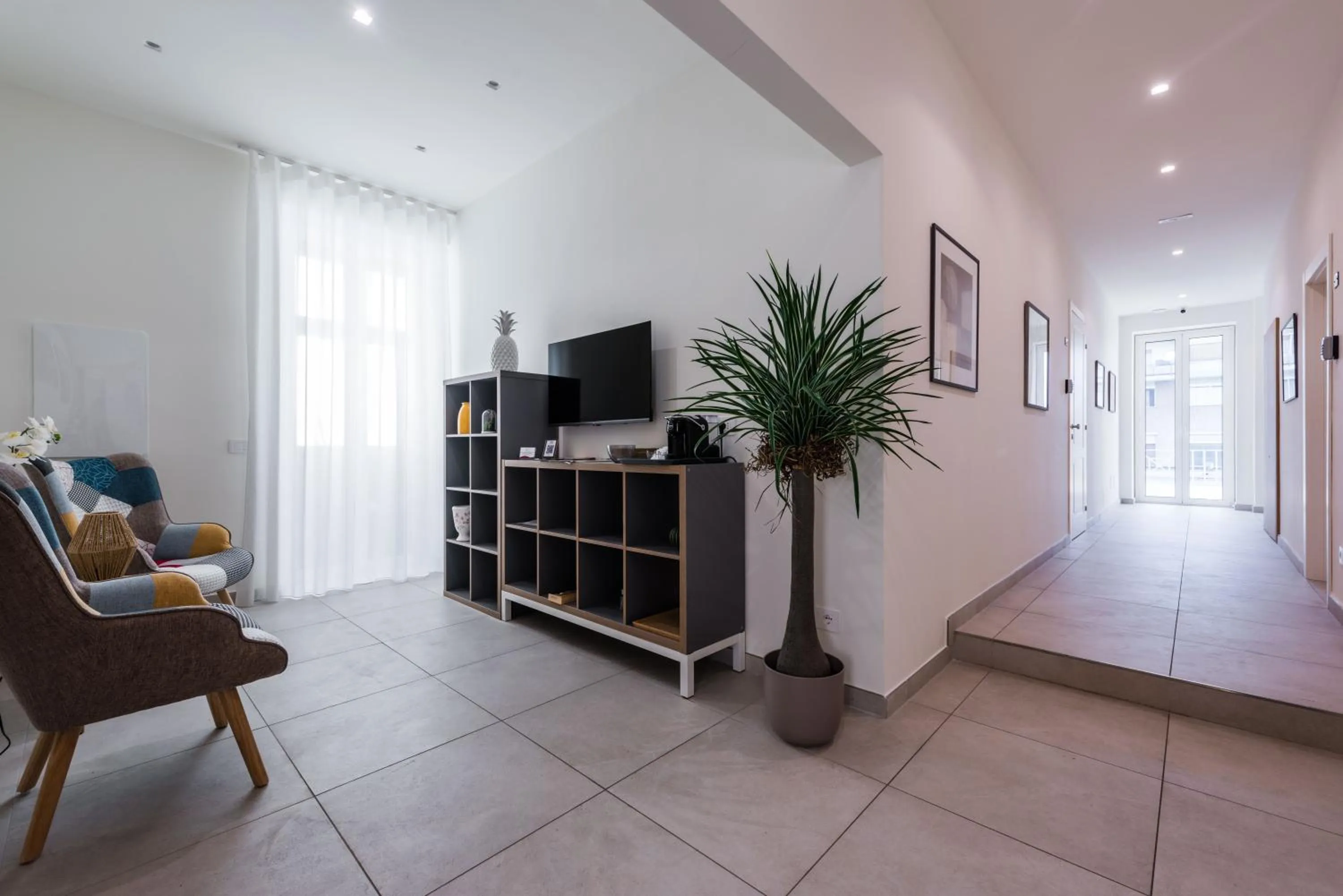 Communal lounge/ TV room in BeBIGEA Rooms