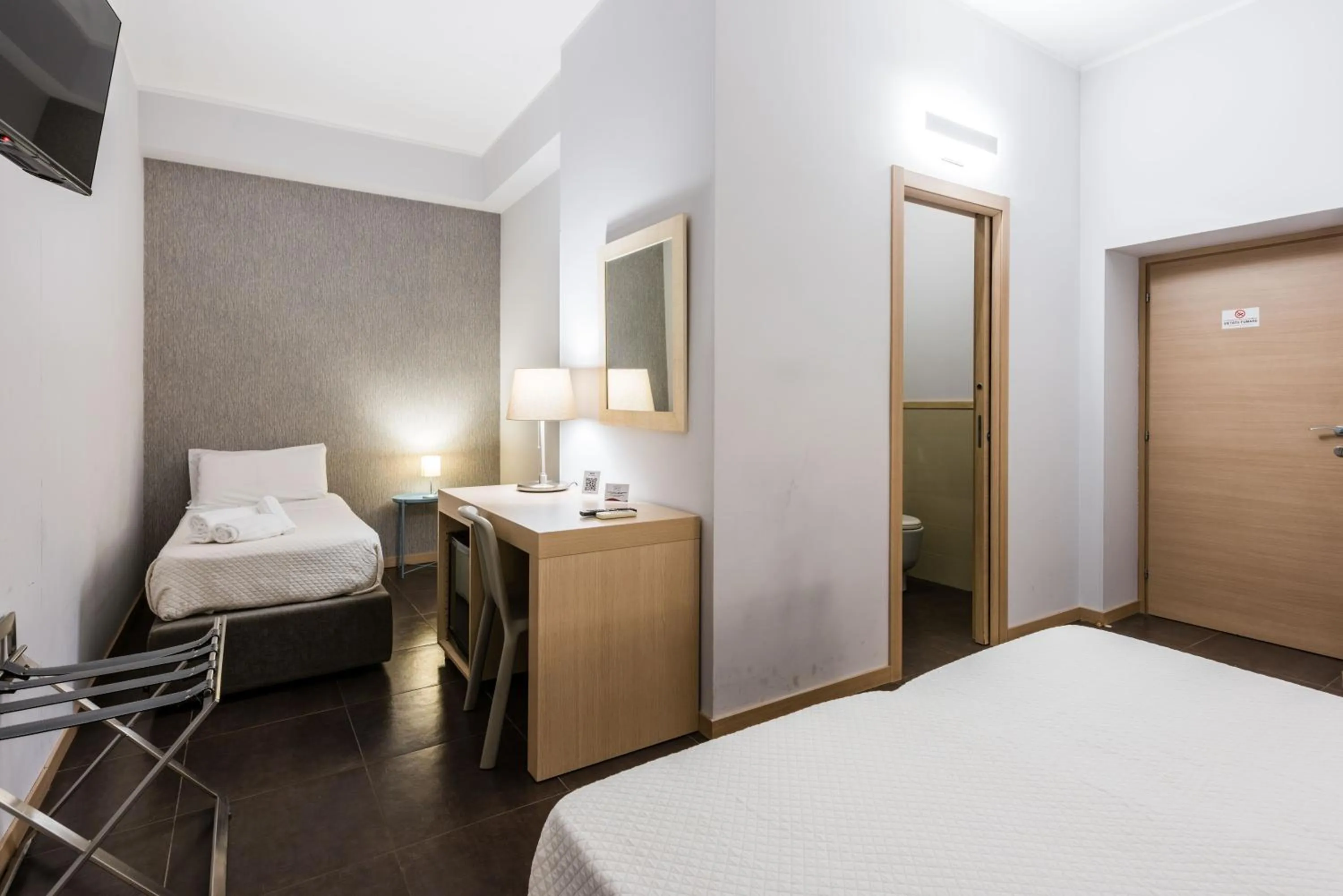 Bed in BeBIGEA Rooms