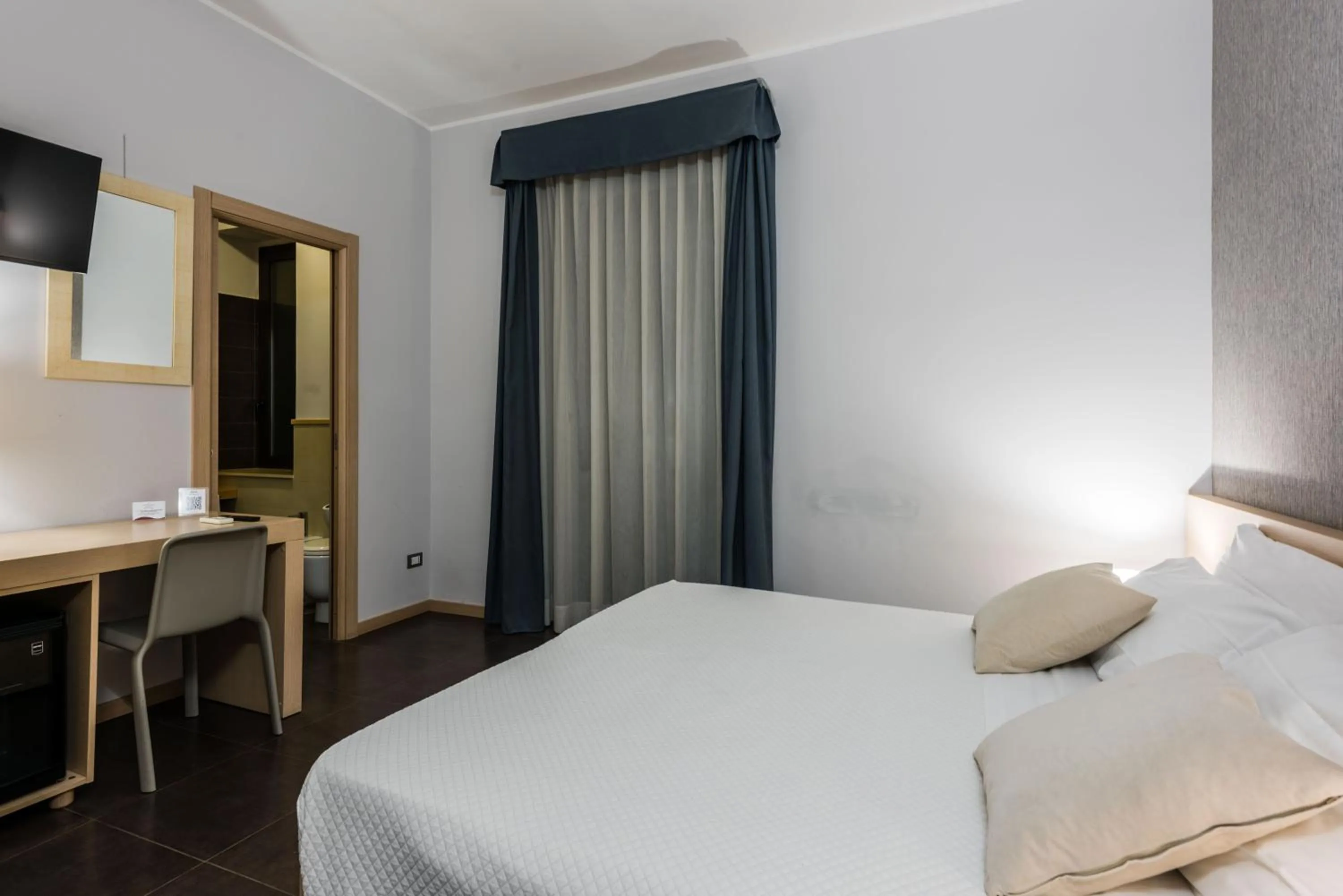 Bed in BeBIGEA Rooms