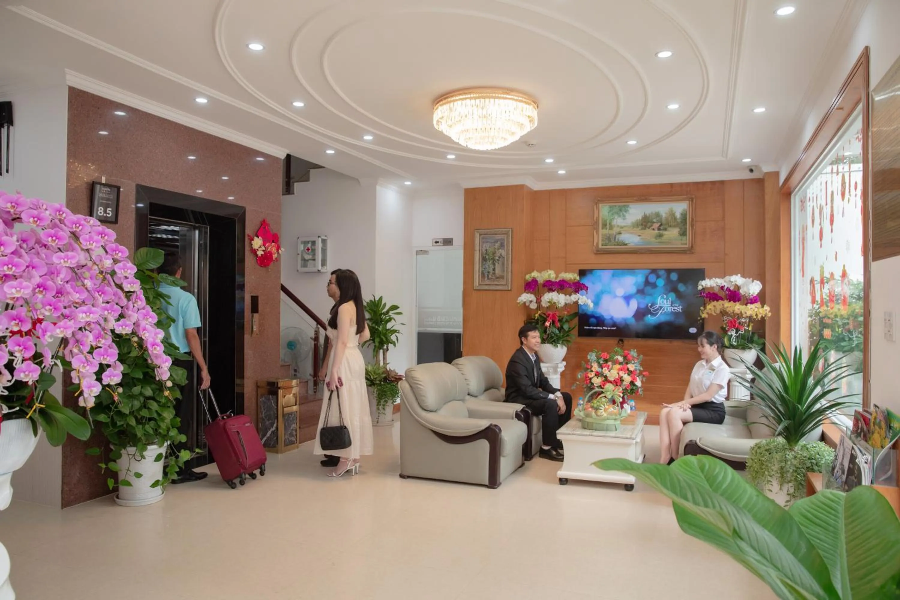 Communal lounge/ TV room in Novena Hotel