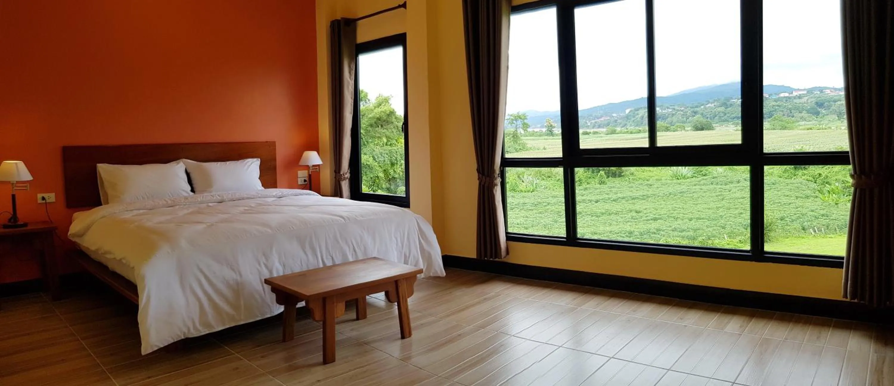 Bed in Baan Sakuna Hotel