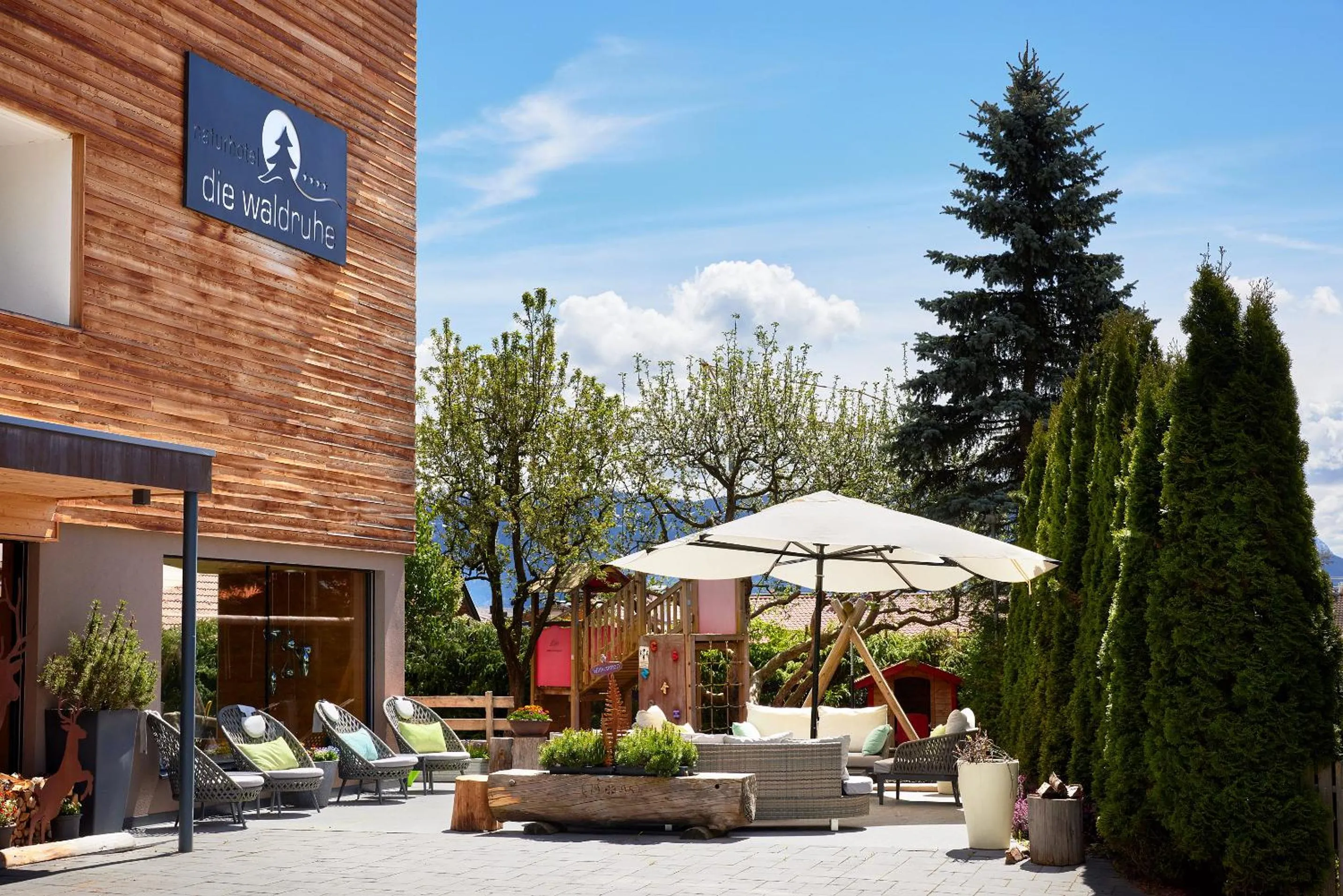 Garden view in Naturhotel Die Waldruhe GmbH