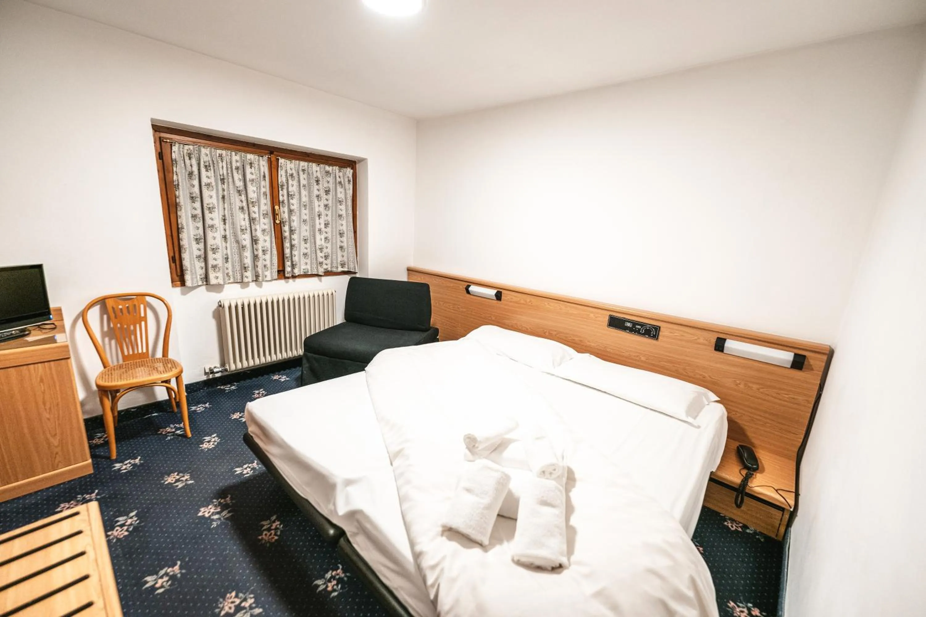 Bed in Smart Hotel Renzi